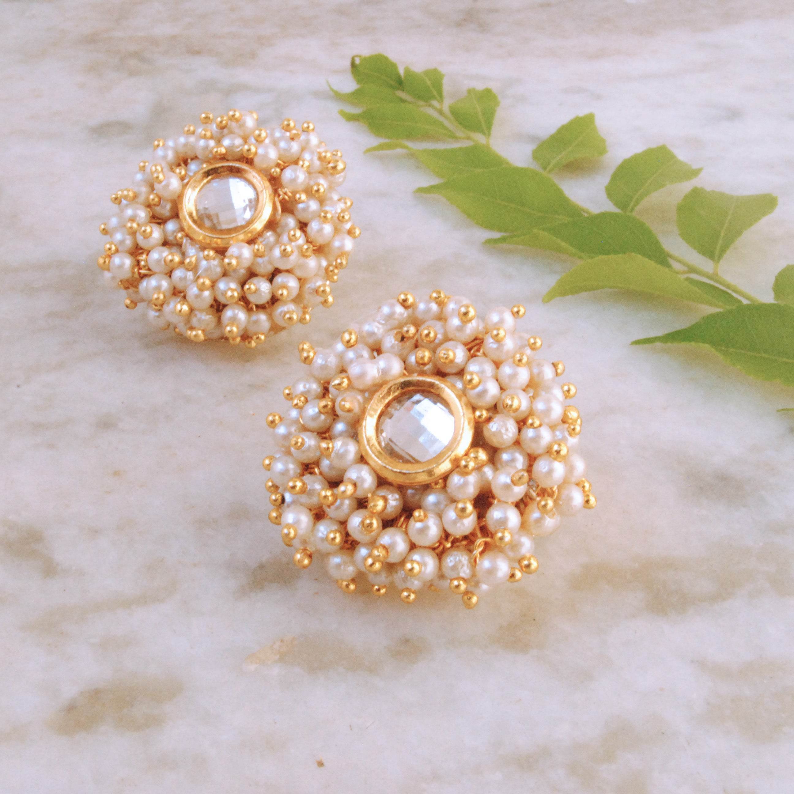 Traditional Kundan earrings in gold-tone, perfect for weddings and festive wear