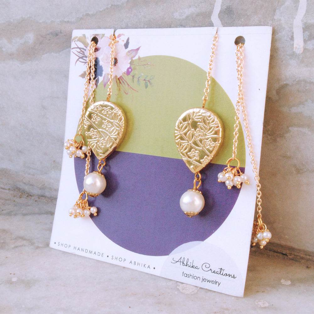 Traditional Kundan earrings in gold-tone, perfect for weddings and festive wear