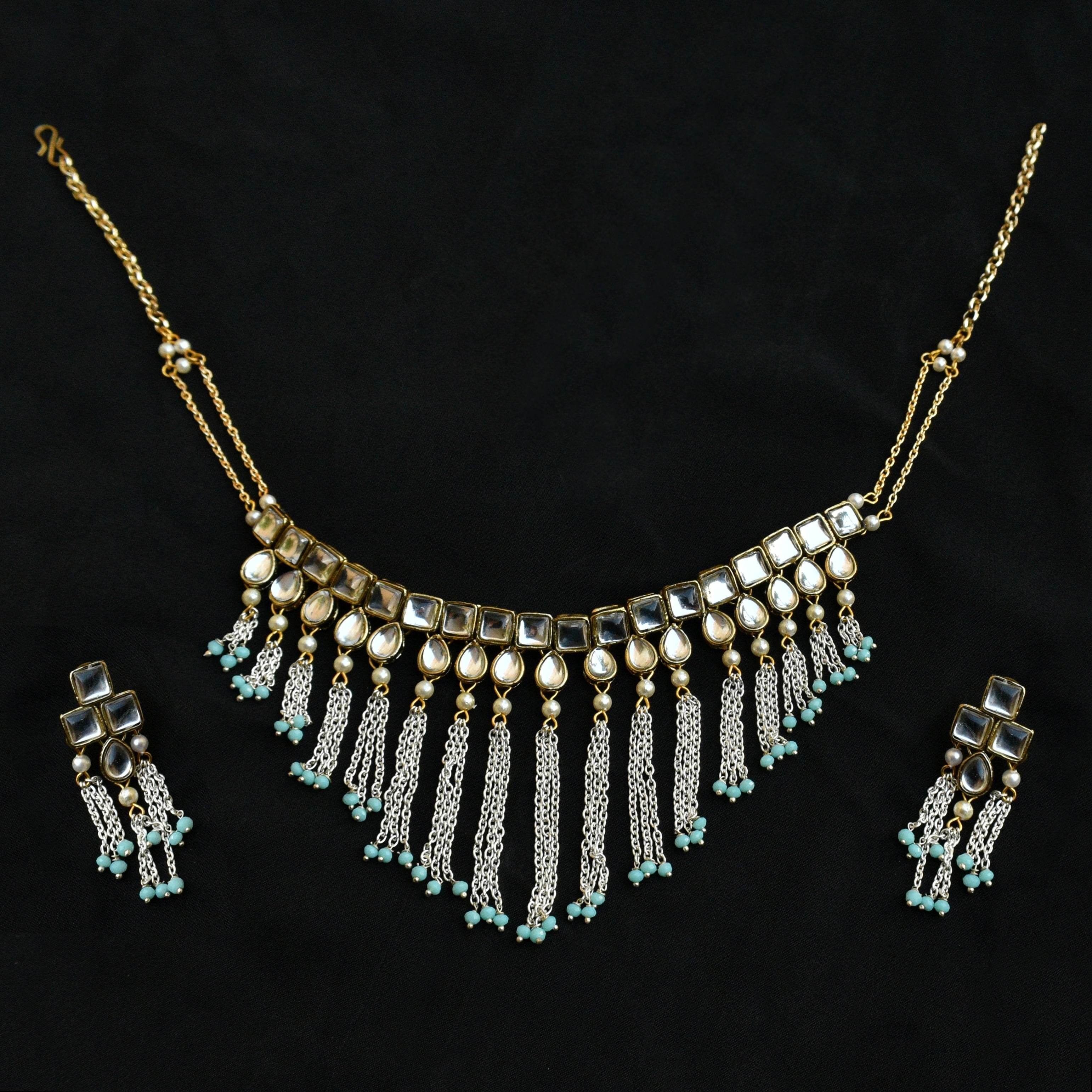 Kundan choker set in gold-tone with matching earrings and long bridal necklace, perfect for wedding functions , festive and bridal wear