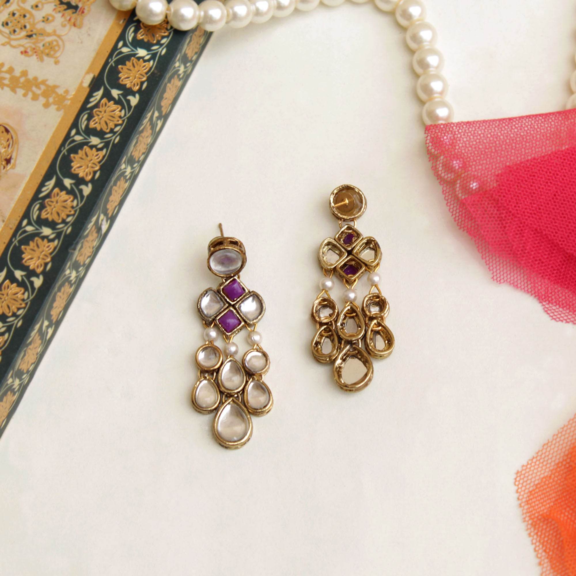 Traditional Kundan earrings in gold-tone, perfect for weddings and festive wear