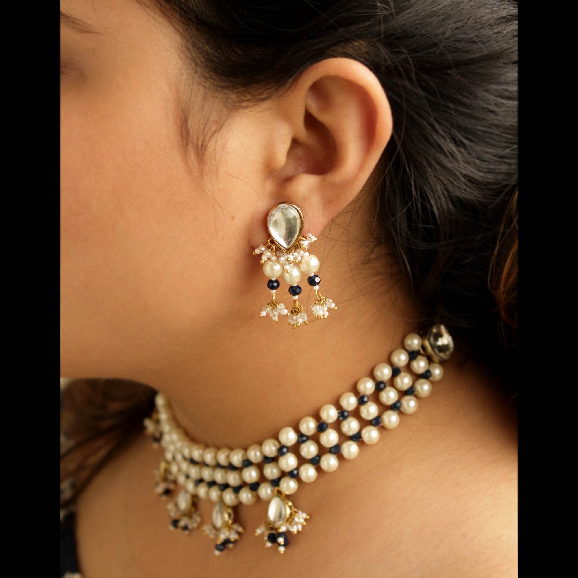 Kundan choker set in gold-tone with matching earrings and long bridal necklace, perfect for wedding functions , festive and bridal wear