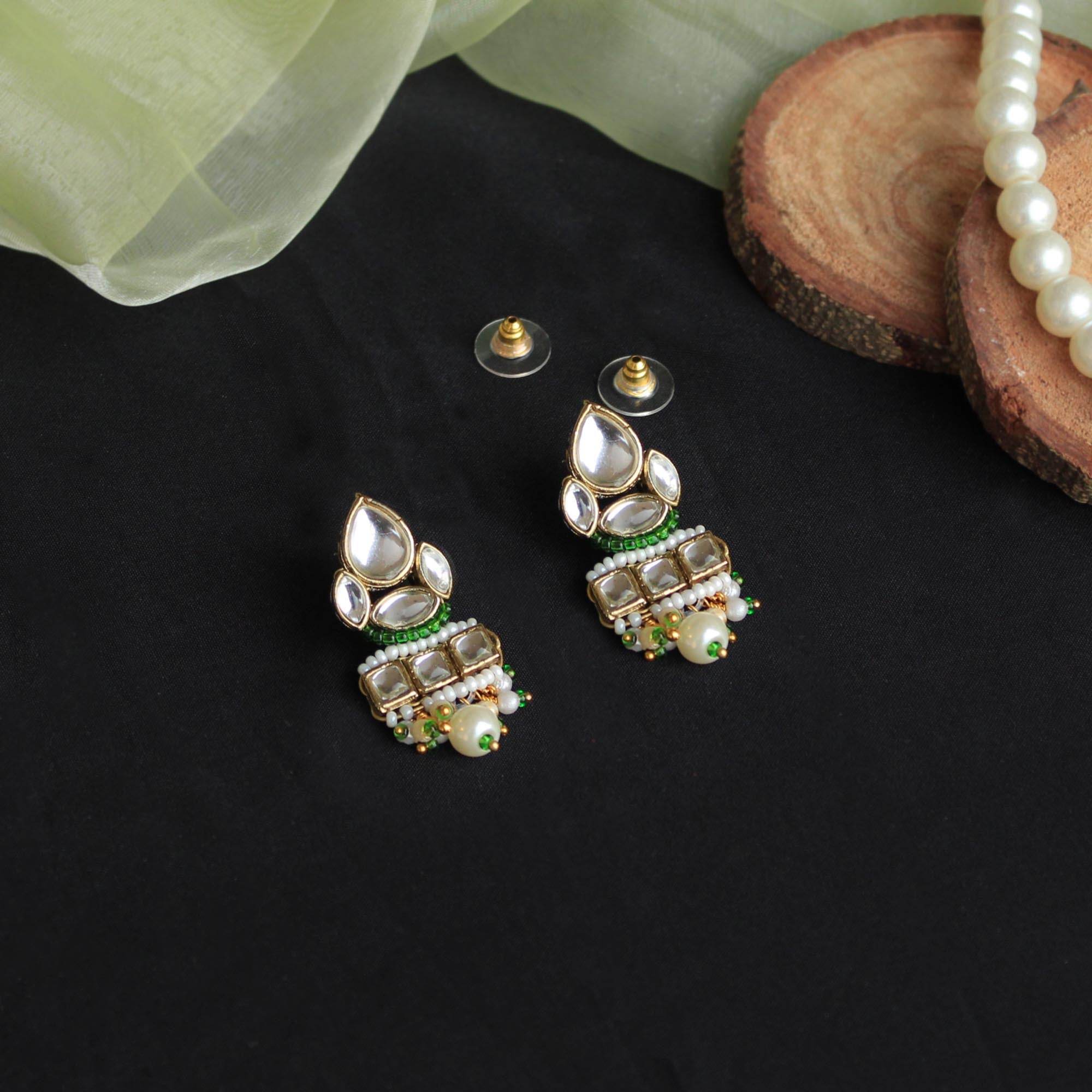 Traditional Kundan earrings in gold-tone, perfect for weddings and festive wear
