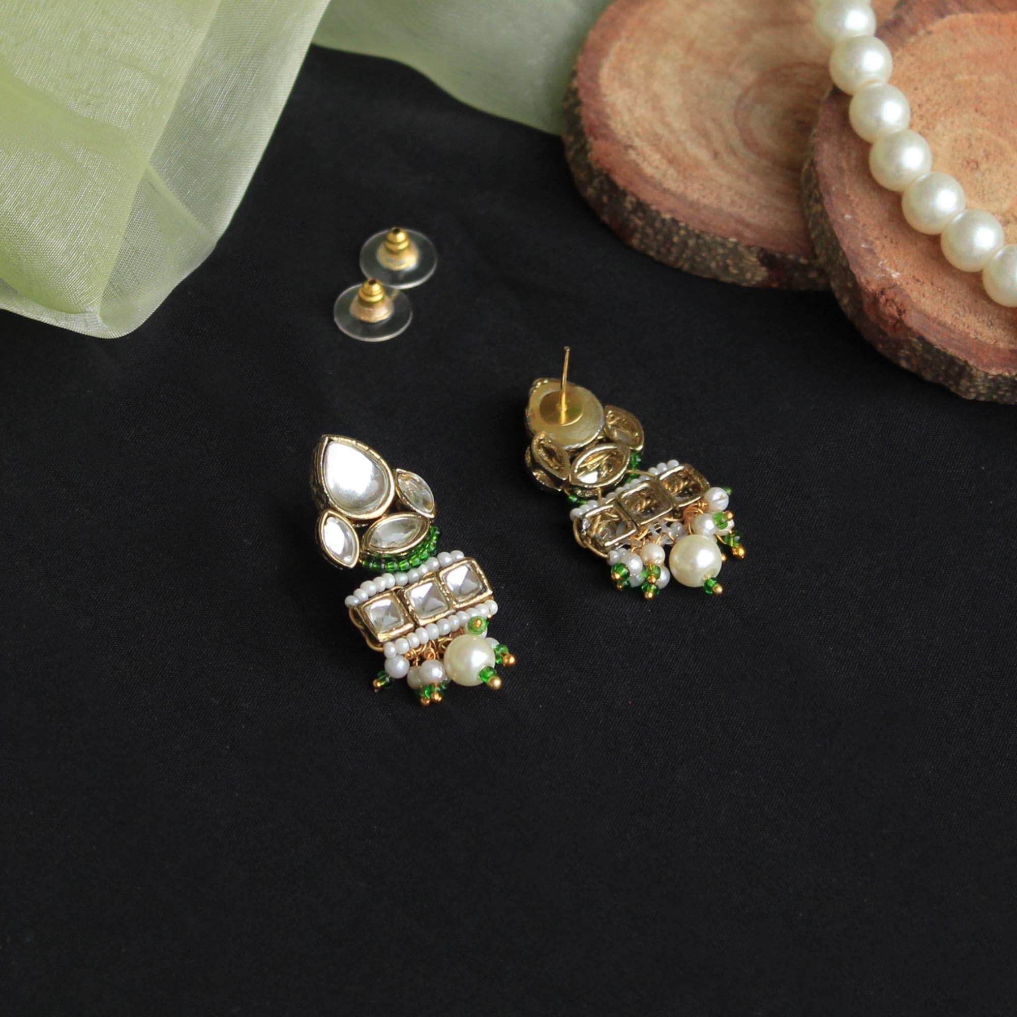 Traditional Kundan earrings in gold-tone, perfect for weddings and festive wear