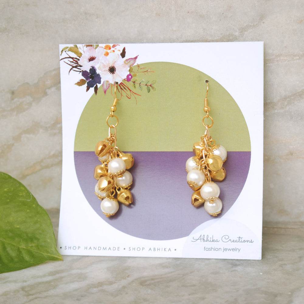 Traditional Kundan earrings in gold-tone, perfect for weddings and festive wear