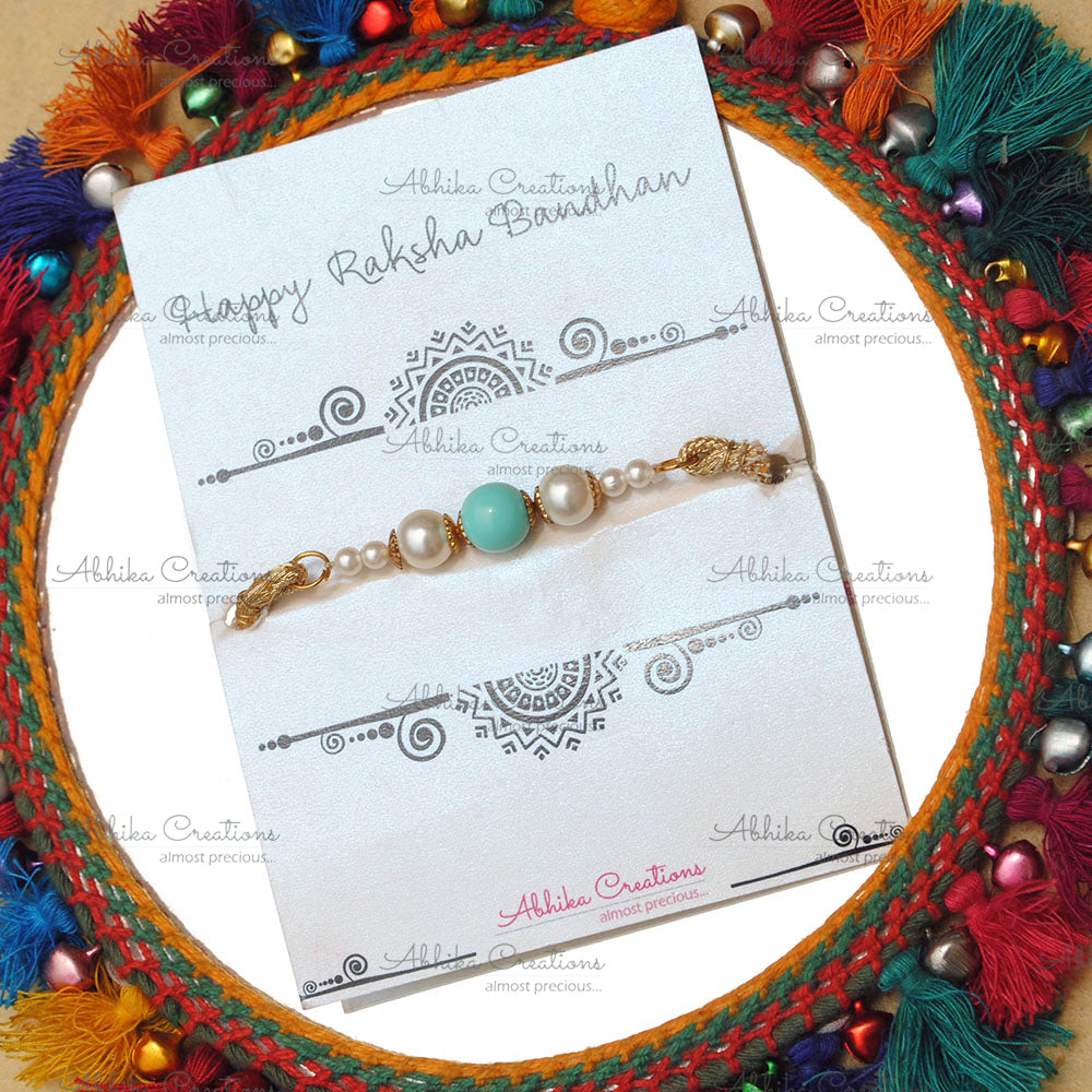 Golden Disc with Turquoise Tassel Lumba And Bhai Rakhi Combo