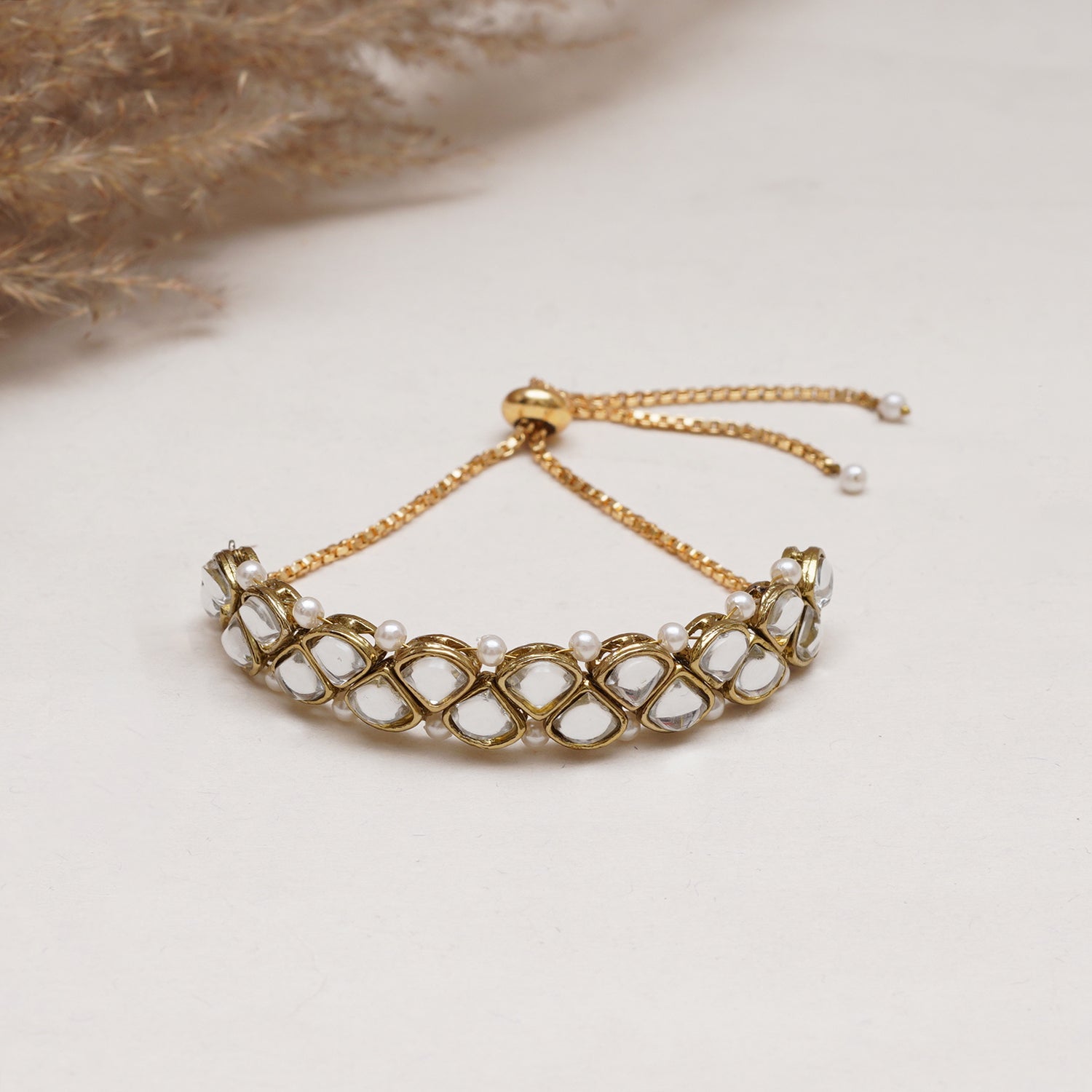 Golden Triangle Kundan With White Pearls Adjustable Bracelet