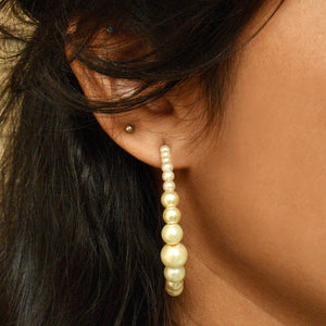 Traditional Kundan earrings in gold-tone, perfect for weddings and festive wear