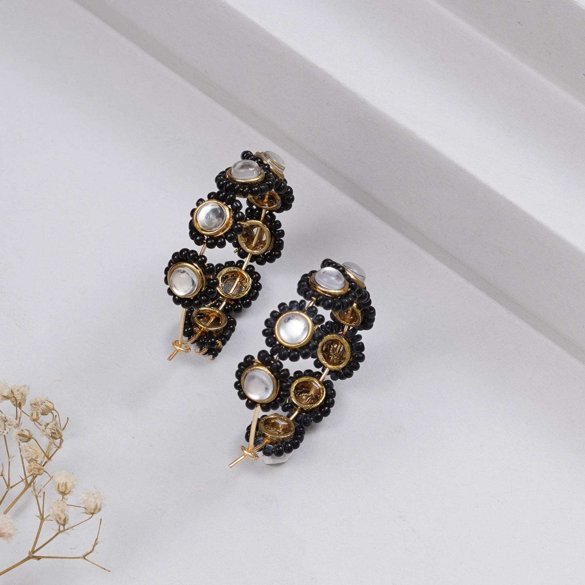 Traditional Kundan earrings in gold-tone, perfect for weddings and festive wear