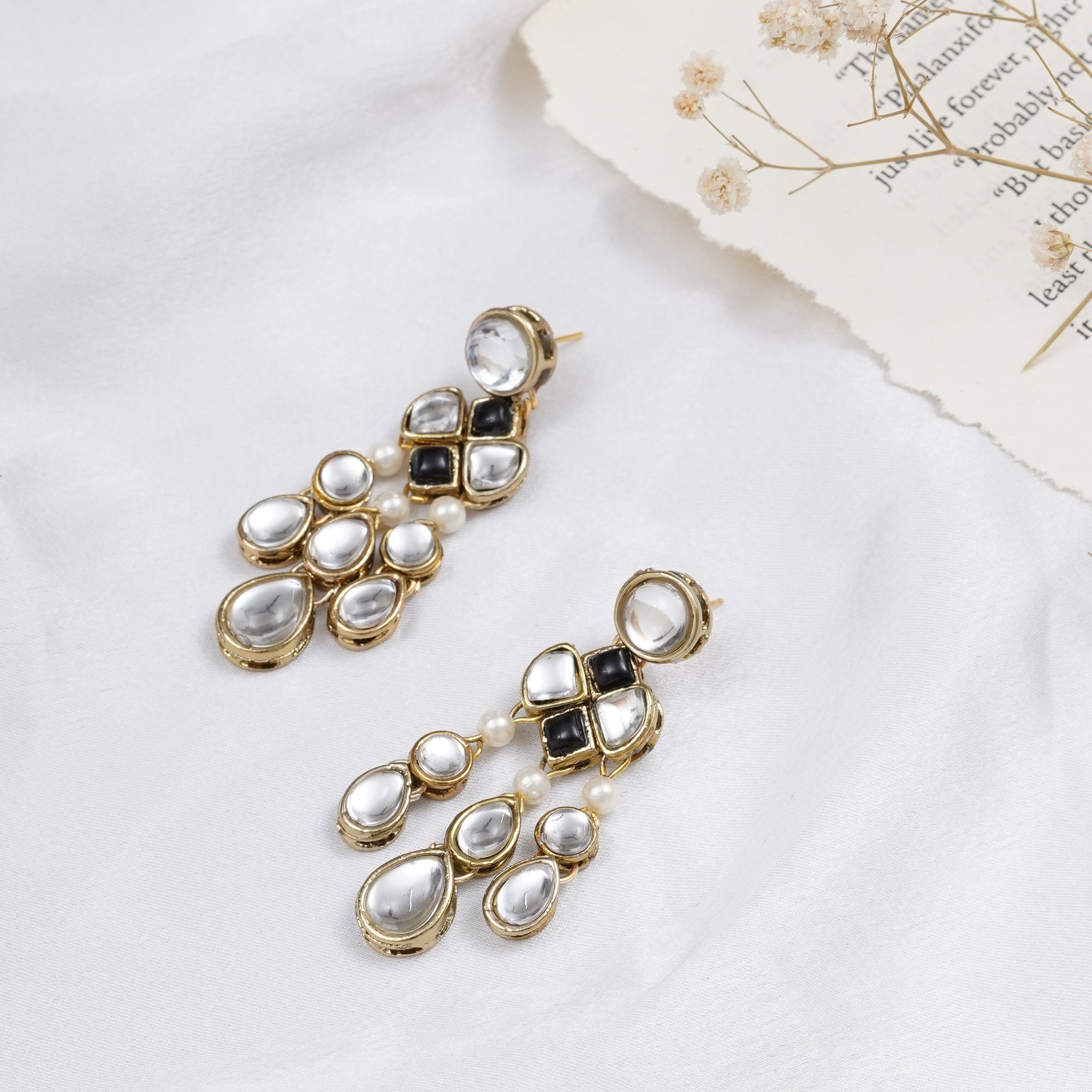 Traditional Kundan earrings in gold-tone, perfect for weddings and festive wear