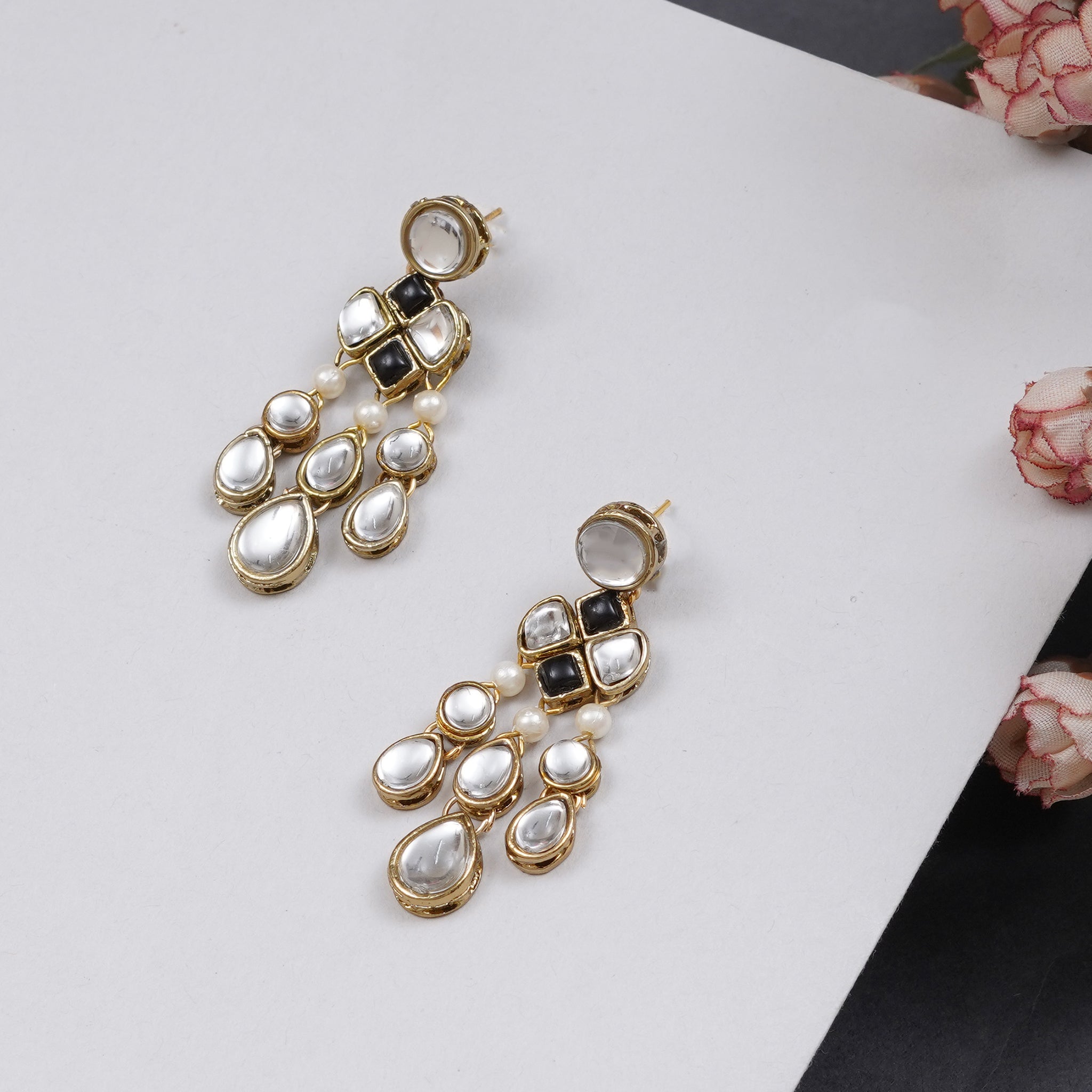 Traditional Kundan earrings in gold-tone, perfect for weddings and festive wear