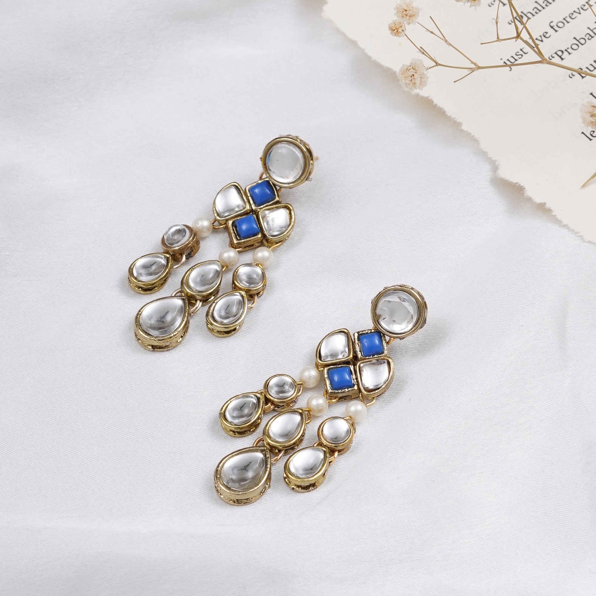 Traditional Kundan earrings in gold-tone, perfect for weddings and festive wear