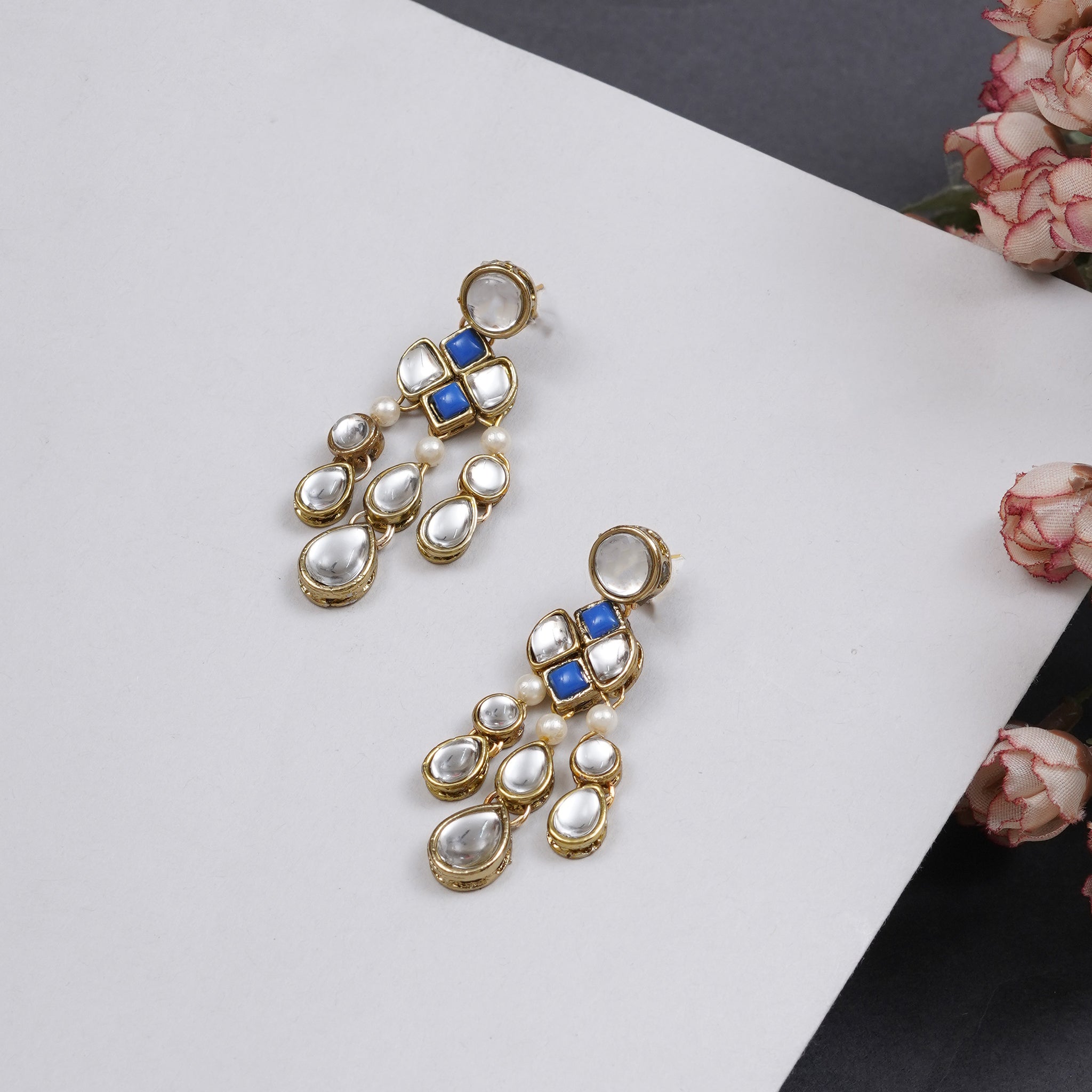 Traditional Kundan earrings in gold-tone, perfect for weddings and festive wear