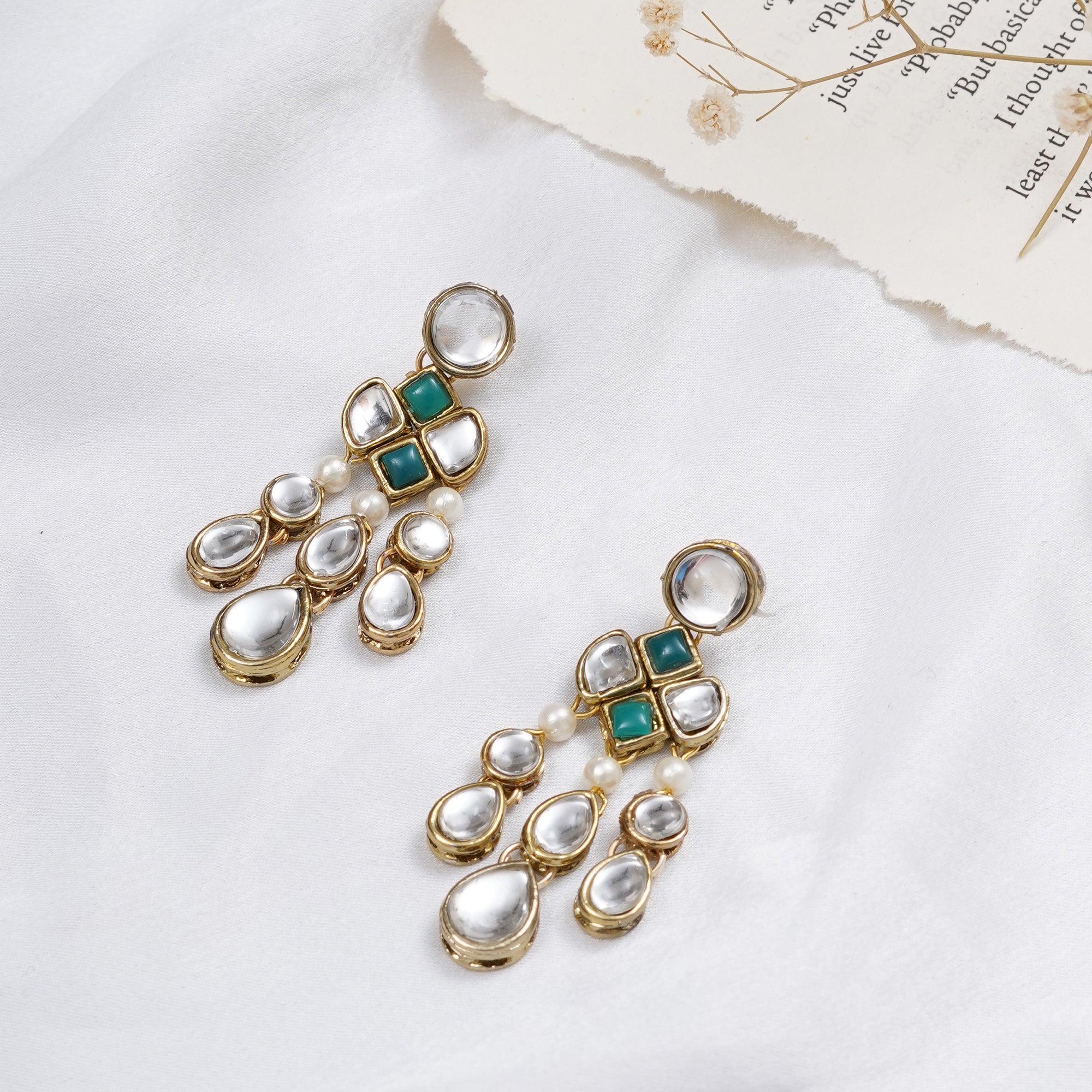 Traditional Kundan earrings in gold-tone, perfect for weddings and festive wear