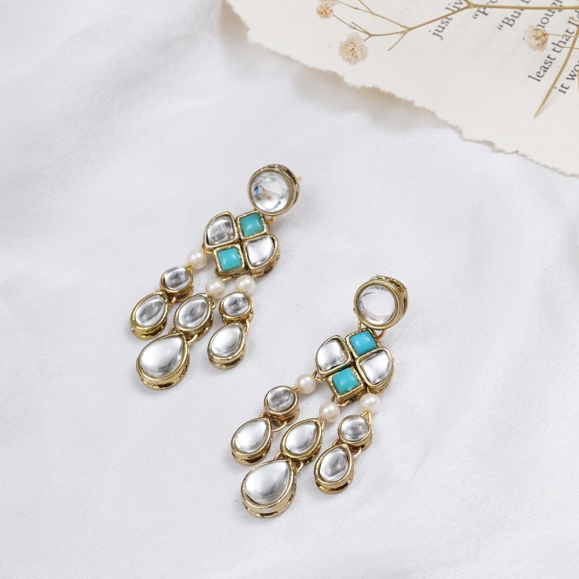 Traditional Kundan earrings in gold-tone, perfect for weddings and festive wear