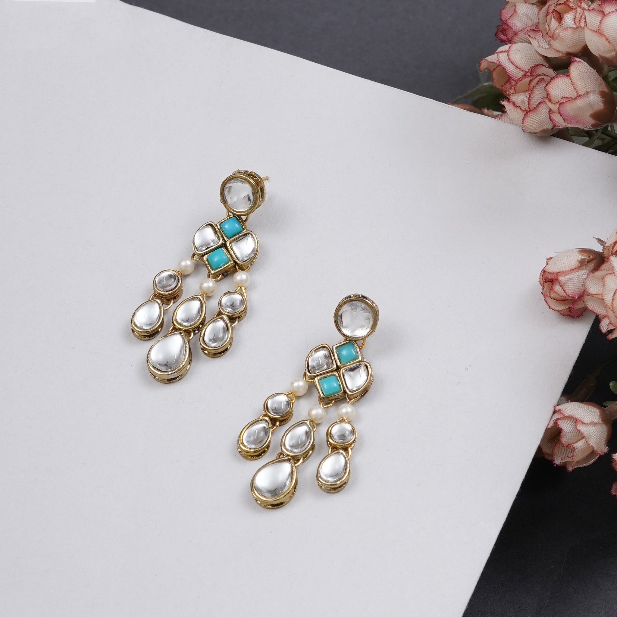 Traditional Kundan earrings in gold-tone, perfect for weddings and festive wear