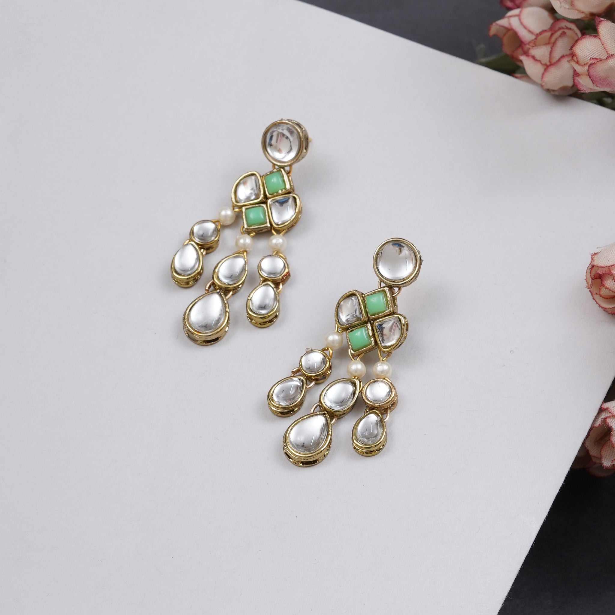 Traditional Kundan earrings in gold-tone, perfect for weddings and festive wear