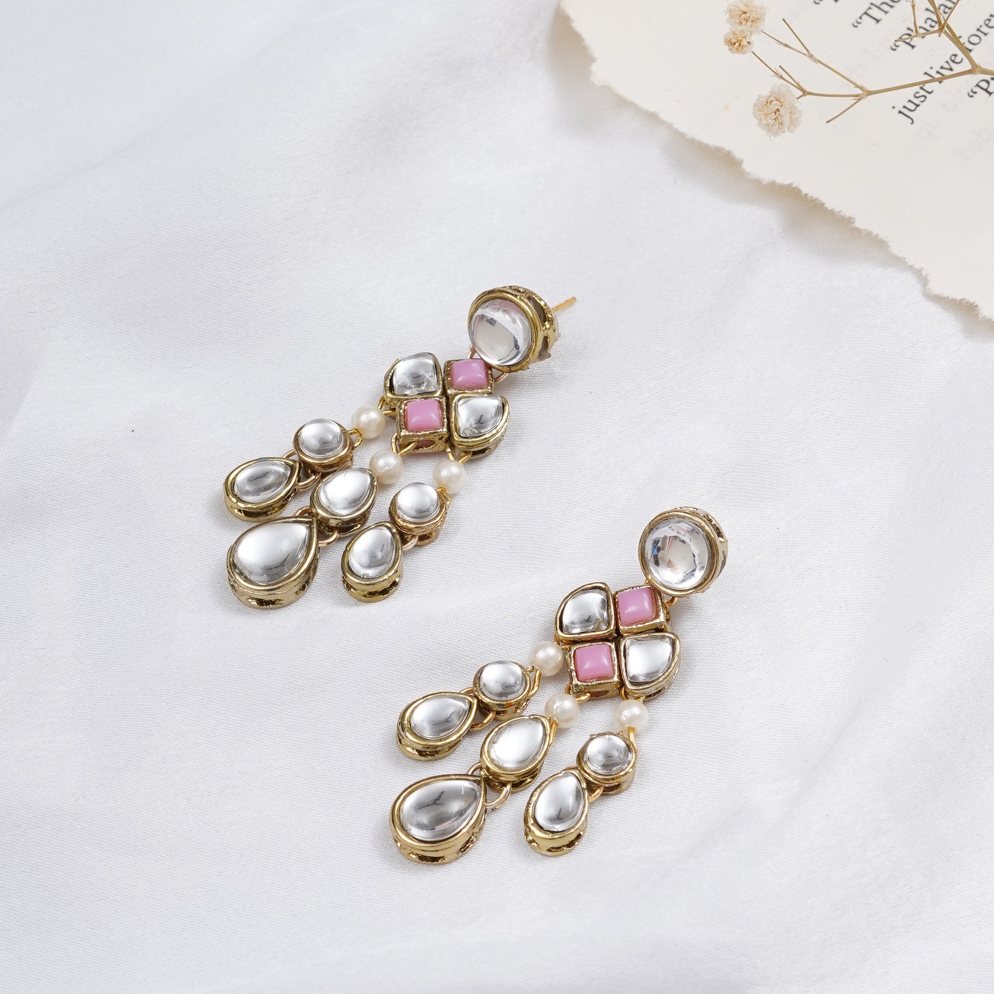 Traditional Kundan earrings in gold-tone, perfect for weddings and festive wear