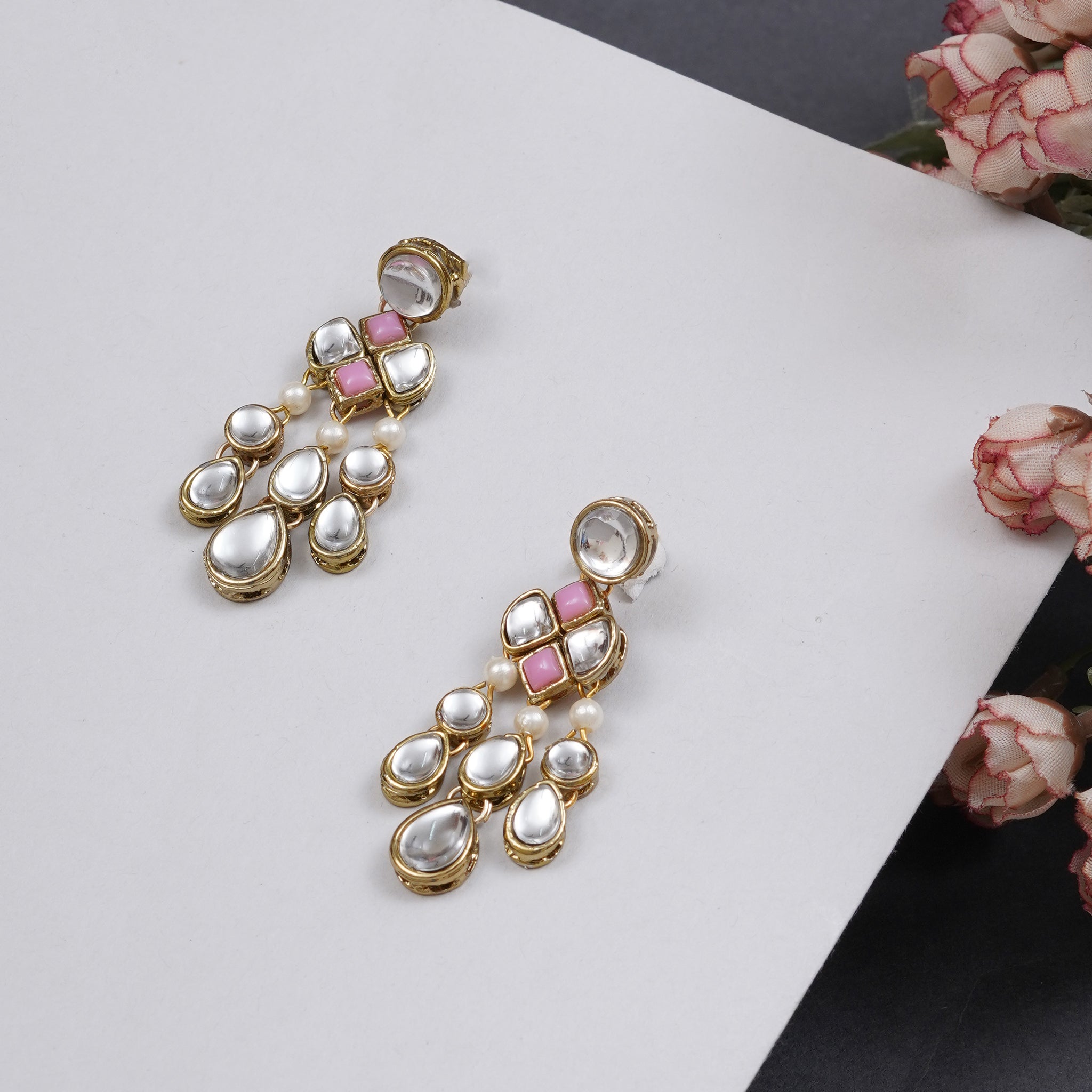 Traditional Kundan earrings in gold-tone, perfect for weddings and festive wear