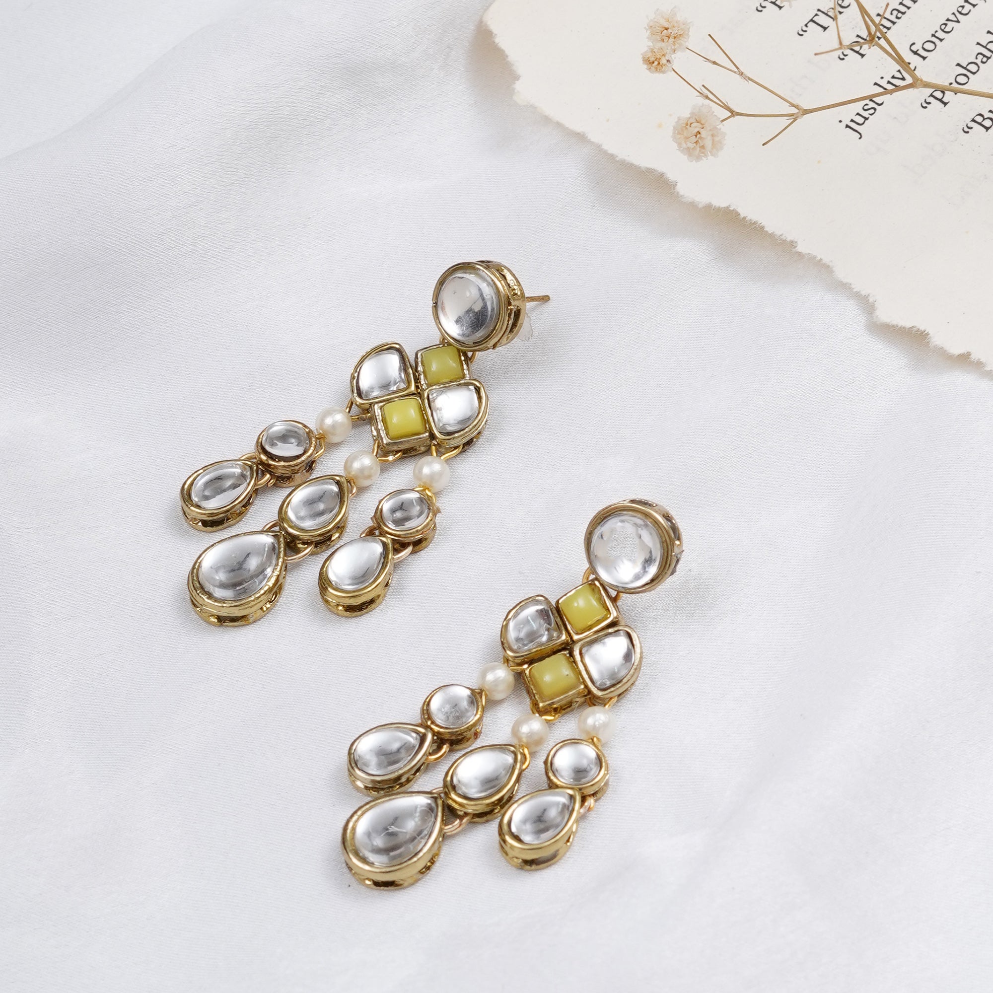 Traditional Kundan earrings in gold-tone, perfect for weddings and festive wear