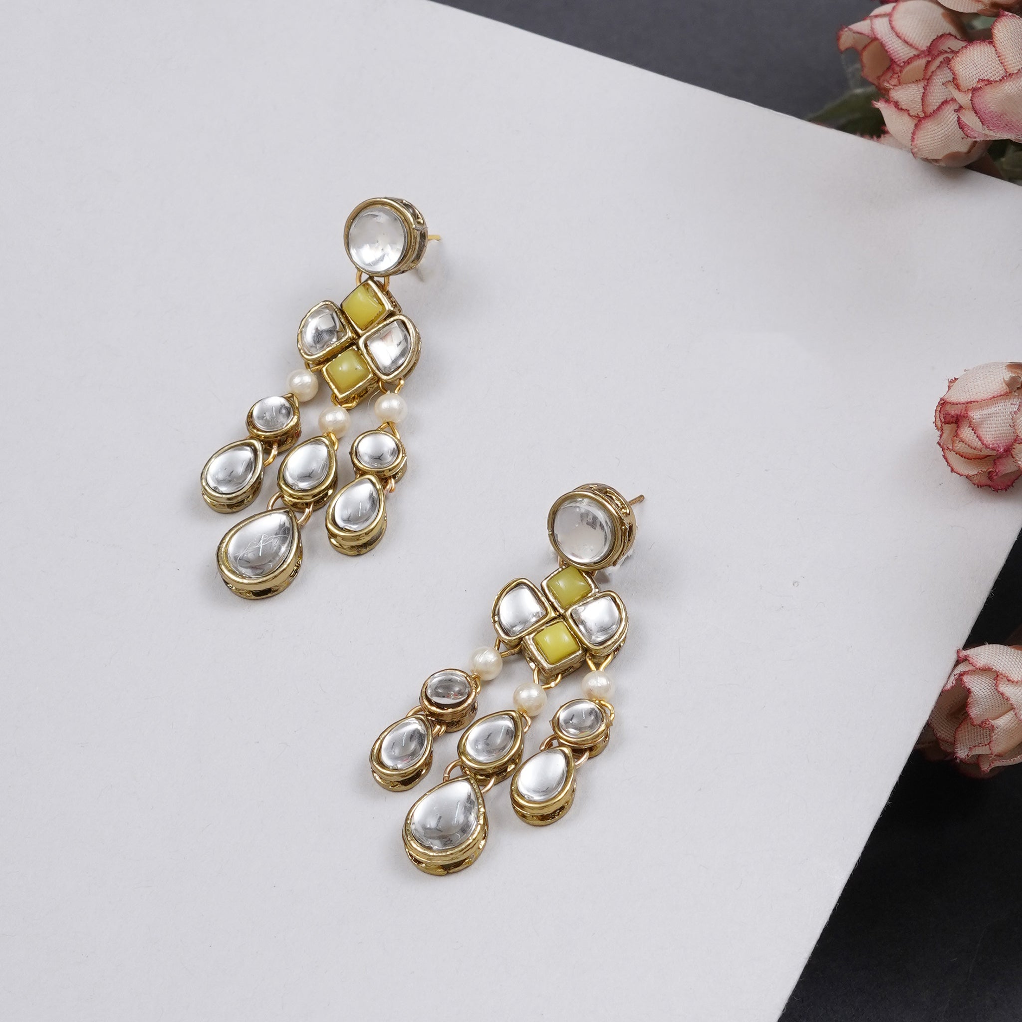 Traditional Kundan earrings in gold-tone, perfect for weddings and festive wear