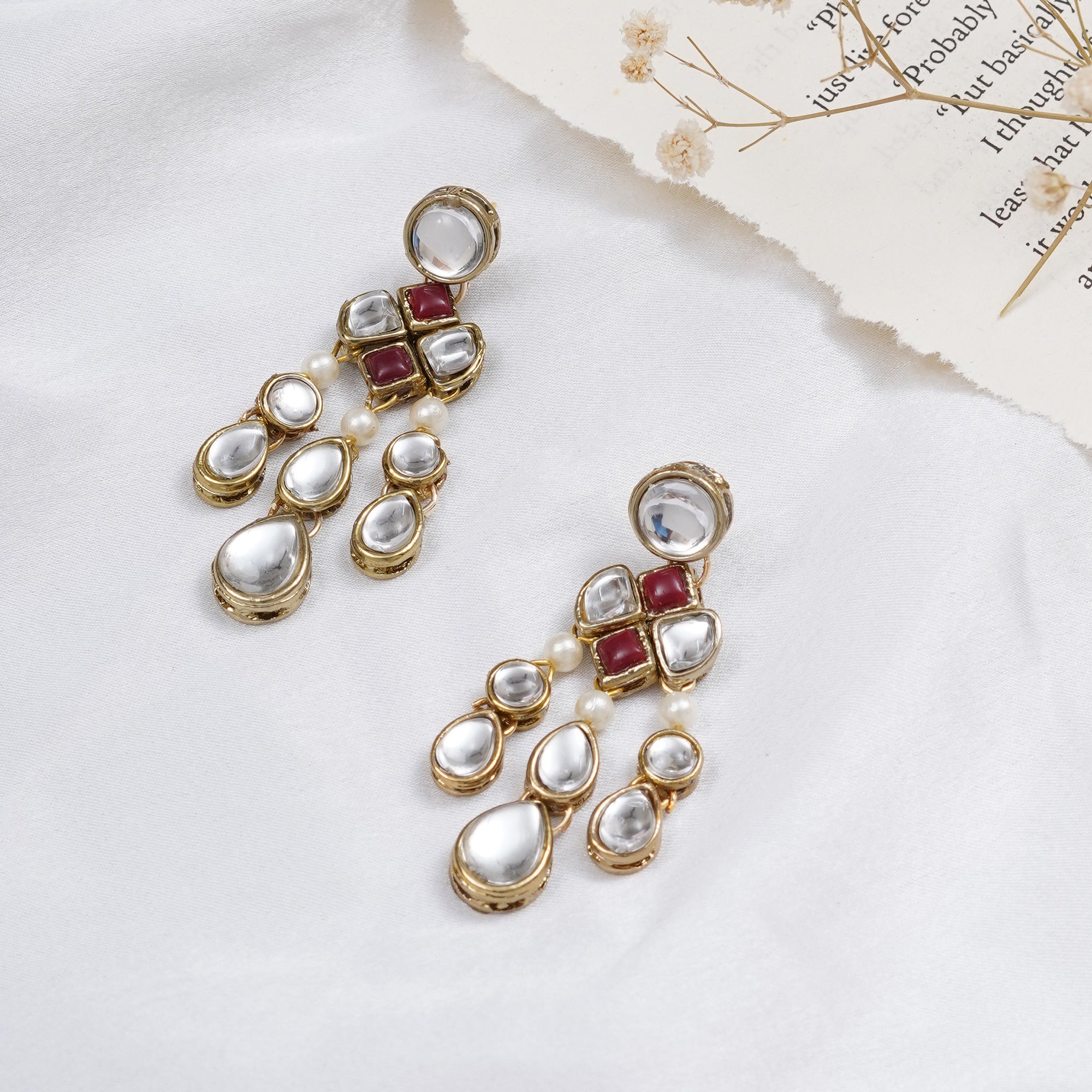 Traditional Kundan earrings in gold-tone, perfect for weddings and festive wear