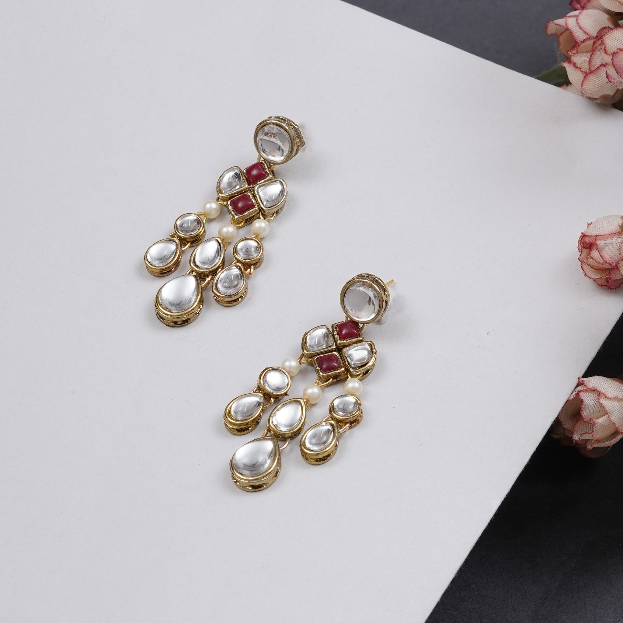 Traditional Kundan earrings in gold-tone, perfect for weddings and festive wear