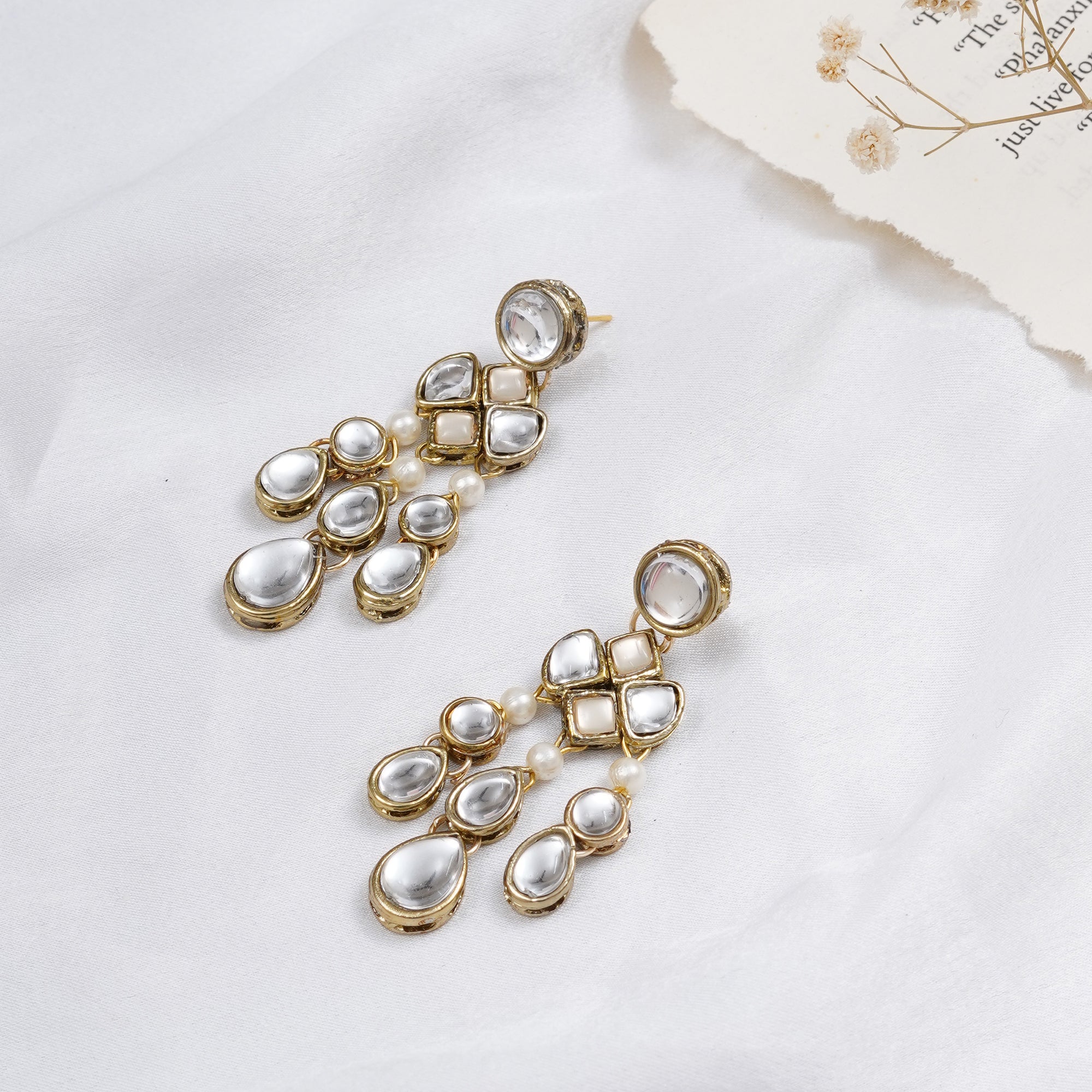 Traditional Kundan earrings in gold-tone, perfect for weddings and festive wear