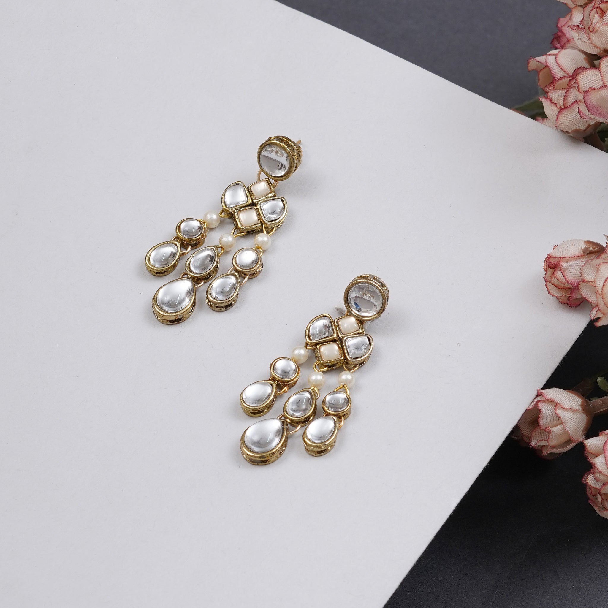 Traditional Kundan earrings in gold-tone, perfect for weddings and festive wear