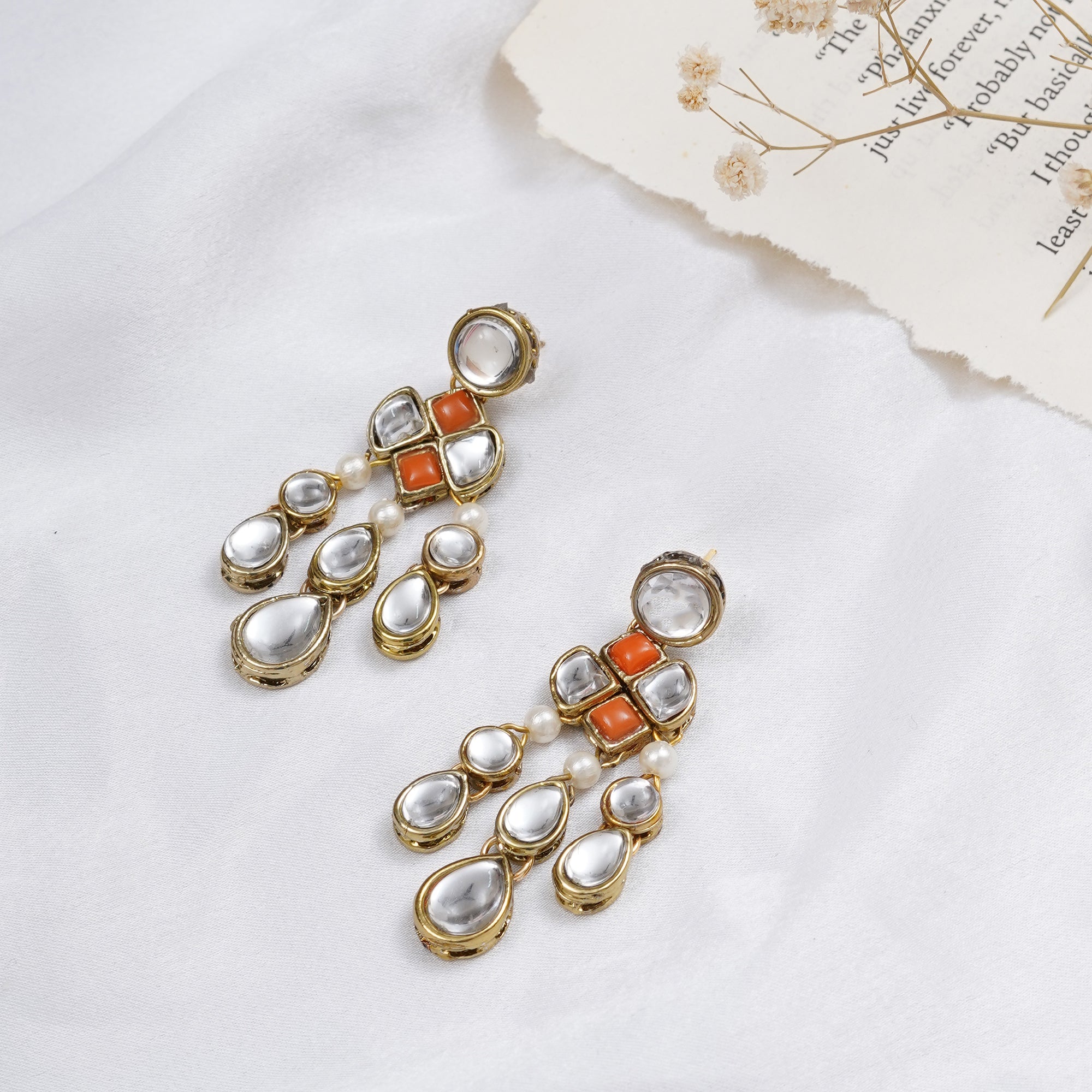 Traditional Kundan earrings in gold-tone, perfect for weddings and festive wear