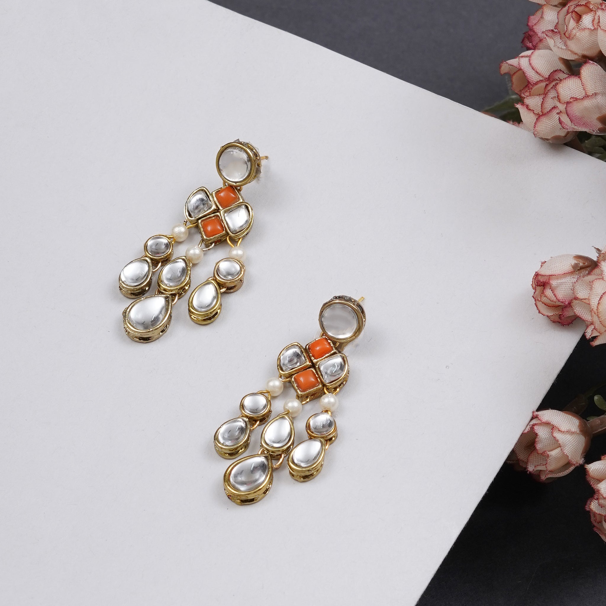 Traditional Kundan earrings in gold-tone, perfect for weddings and festive wear