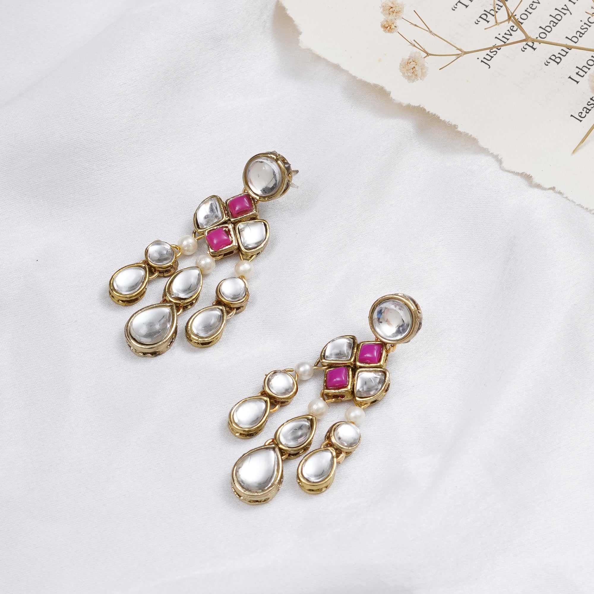 Traditional Kundan earrings in gold-tone, perfect for weddings and festive wear