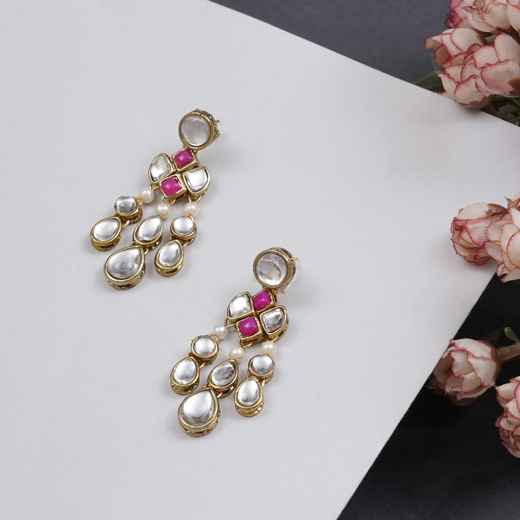 Traditional Kundan earrings in gold-tone, perfect for weddings and festive wear