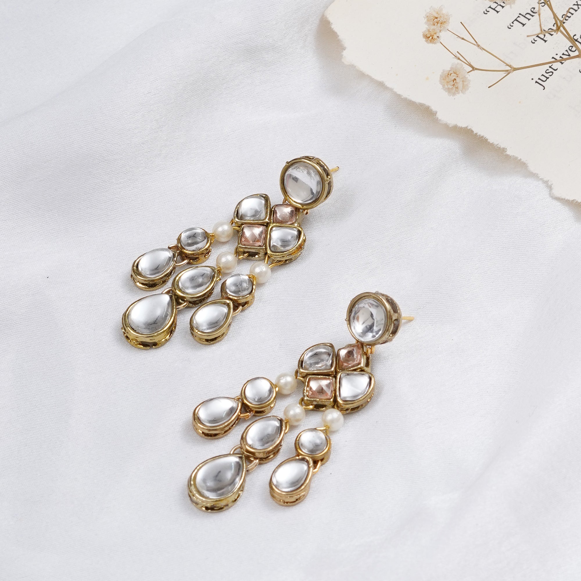 Traditional Kundan earrings in gold-tone, perfect for weddings and festive wear