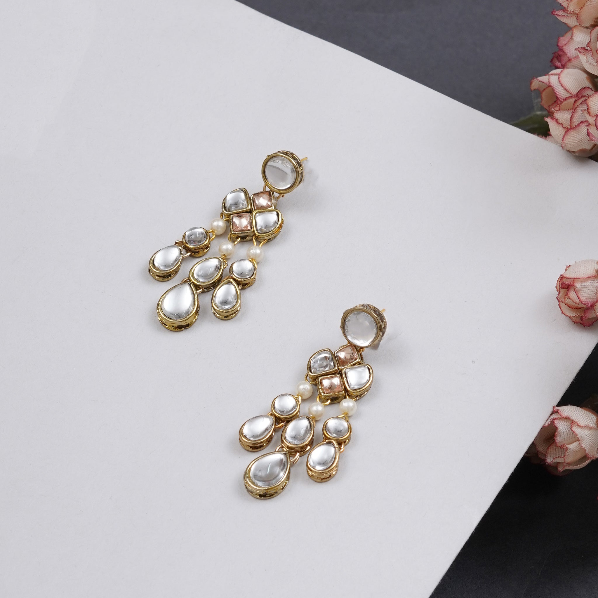 Traditional Kundan earrings in gold-tone, perfect for weddings and festive wear