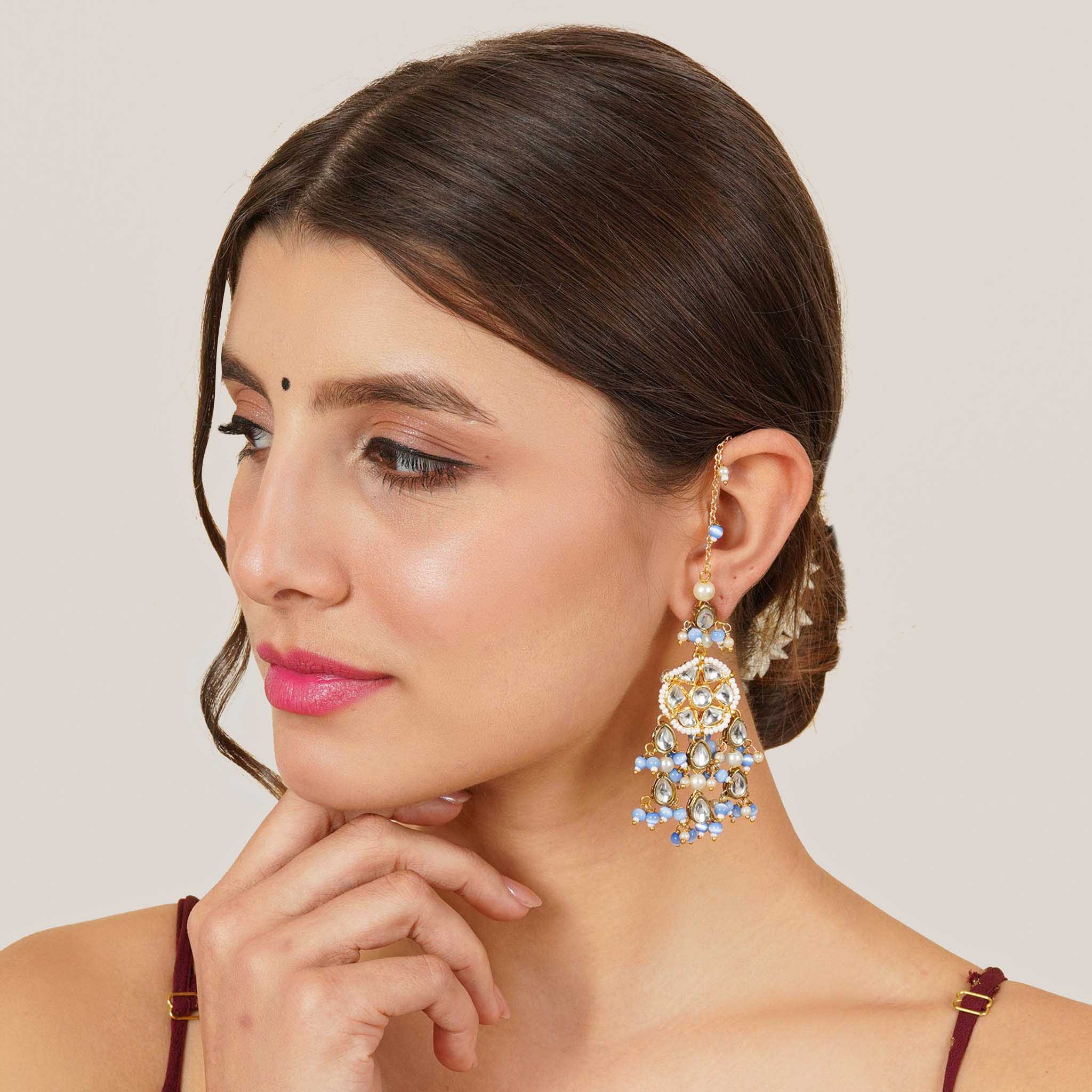 Traditional Kundan earrings in gold-tone, perfect for weddings and festive wear