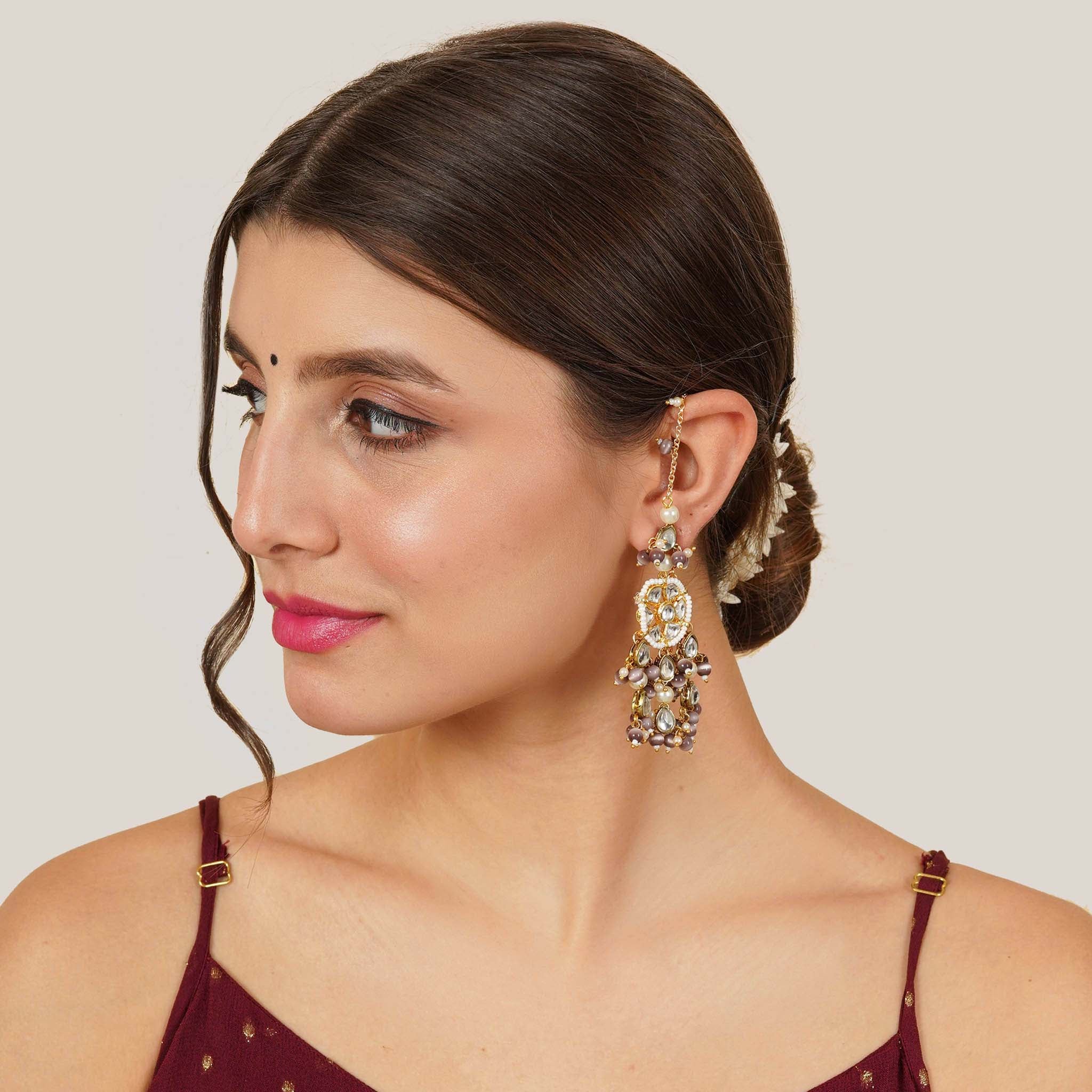 Traditional Kundan earrings in gold-tone, perfect for weddings and festive wear