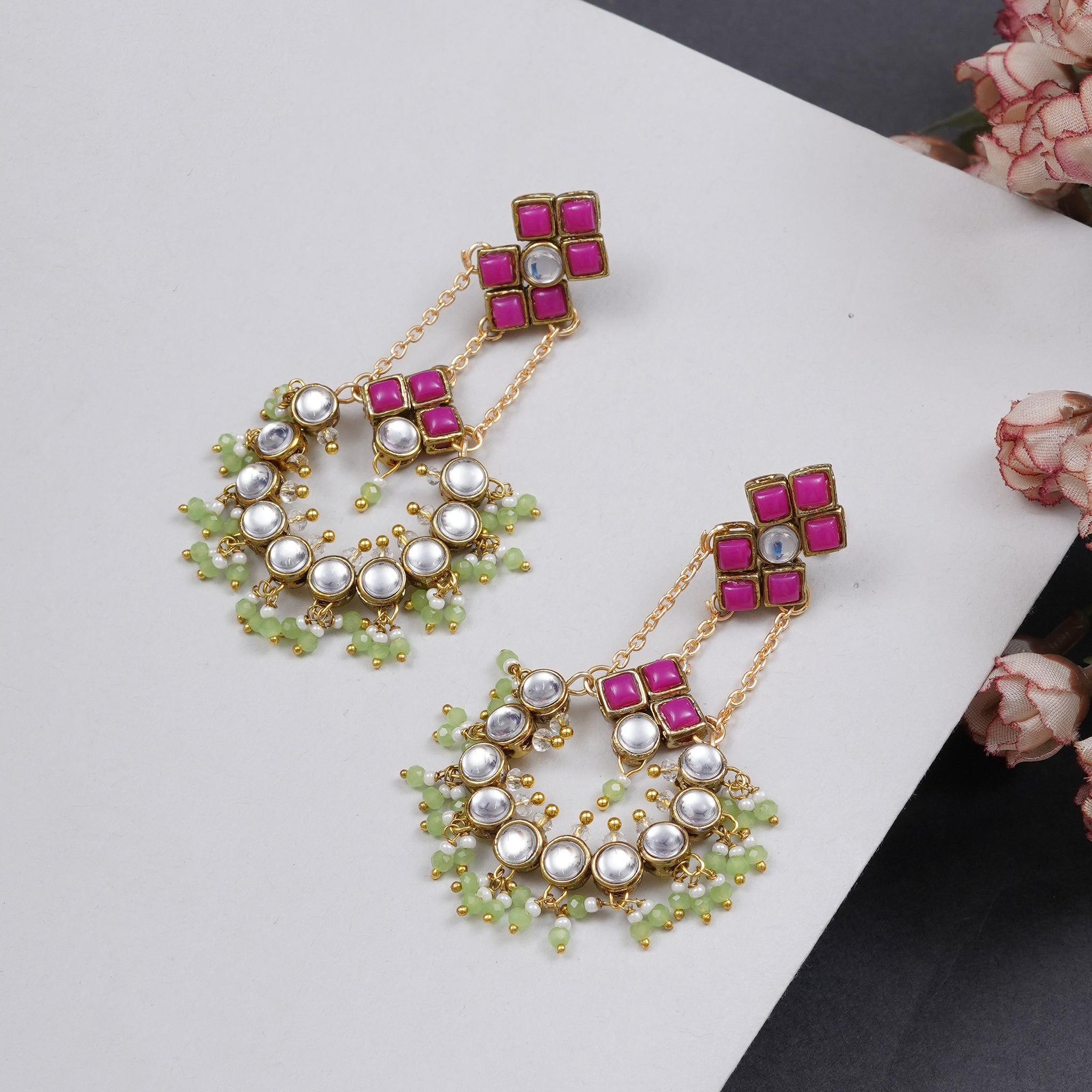 Traditional Kundan earrings in gold-tone, perfect for weddings and festive wear