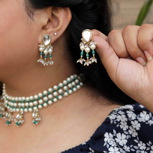 Traditional Kundan earrings in gold-tone, perfect for weddings and festive wear