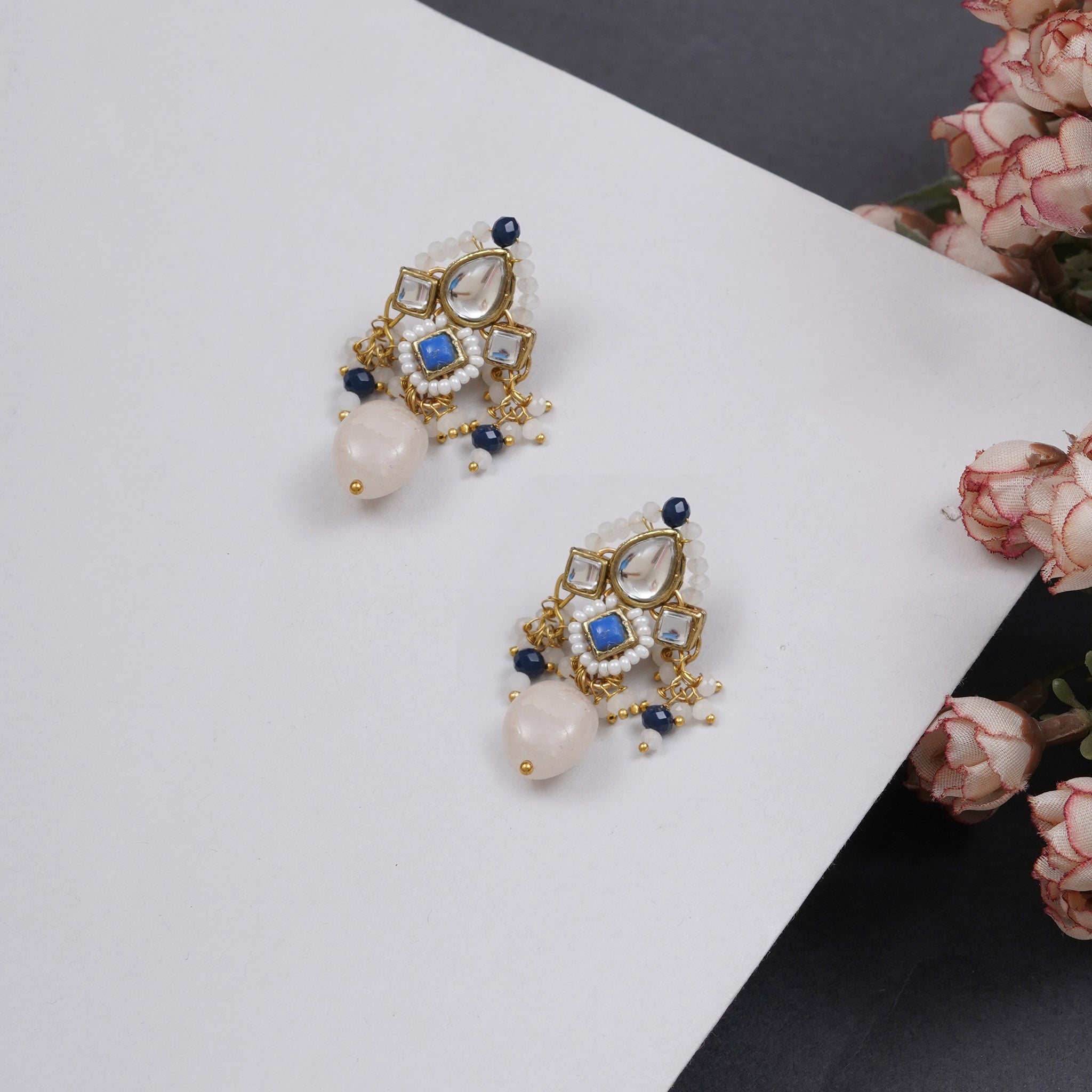 Traditional Kundan earrings in gold-tone, perfect for weddings and festive wear