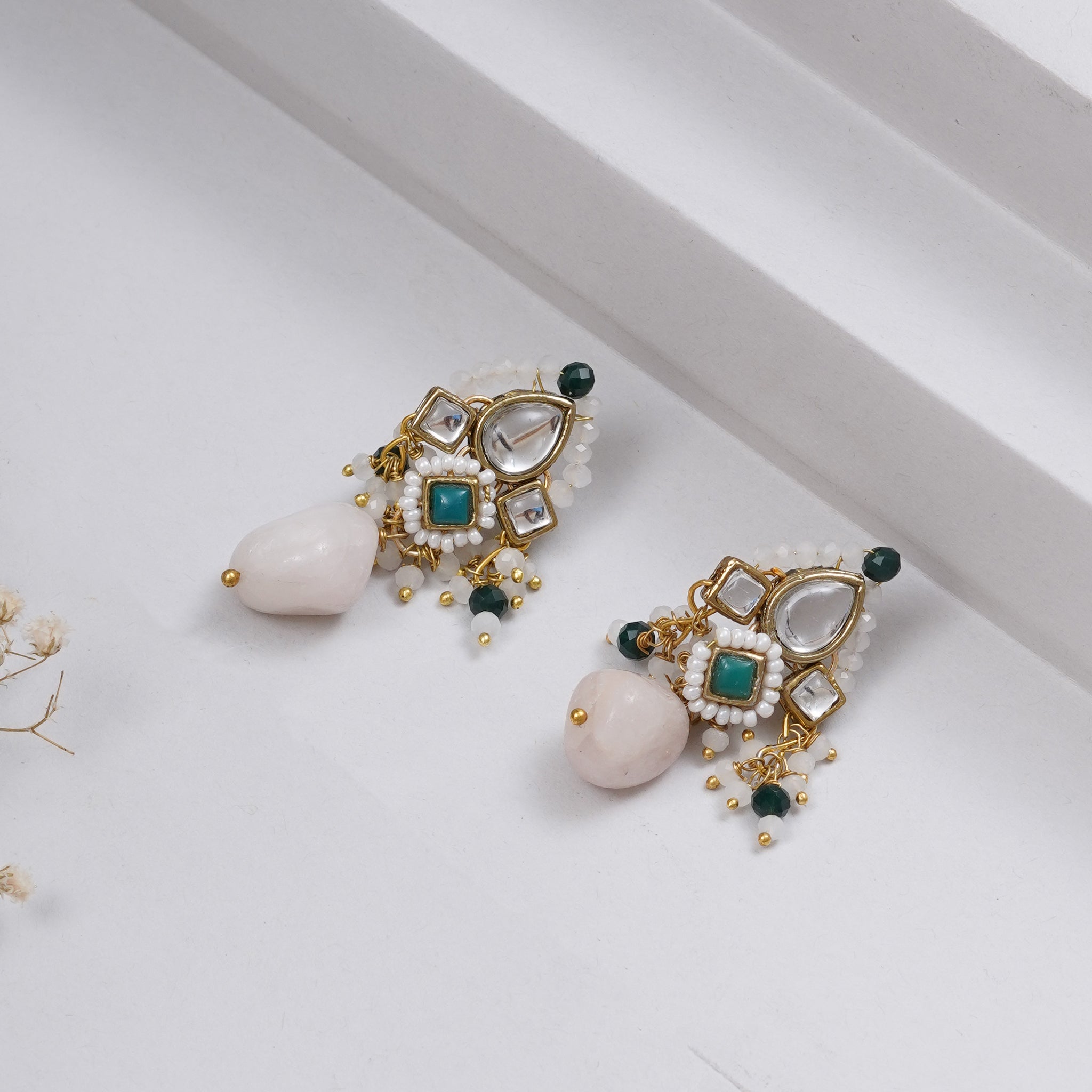 Traditional Kundan earrings in gold-tone, perfect for weddings and festive wear