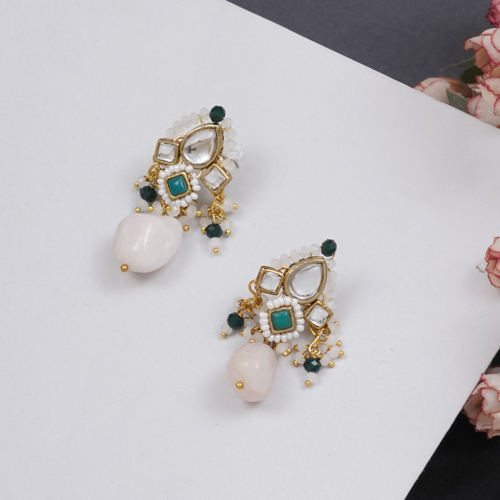 Traditional Kundan earrings in gold-tone, perfect for weddings and festive wear