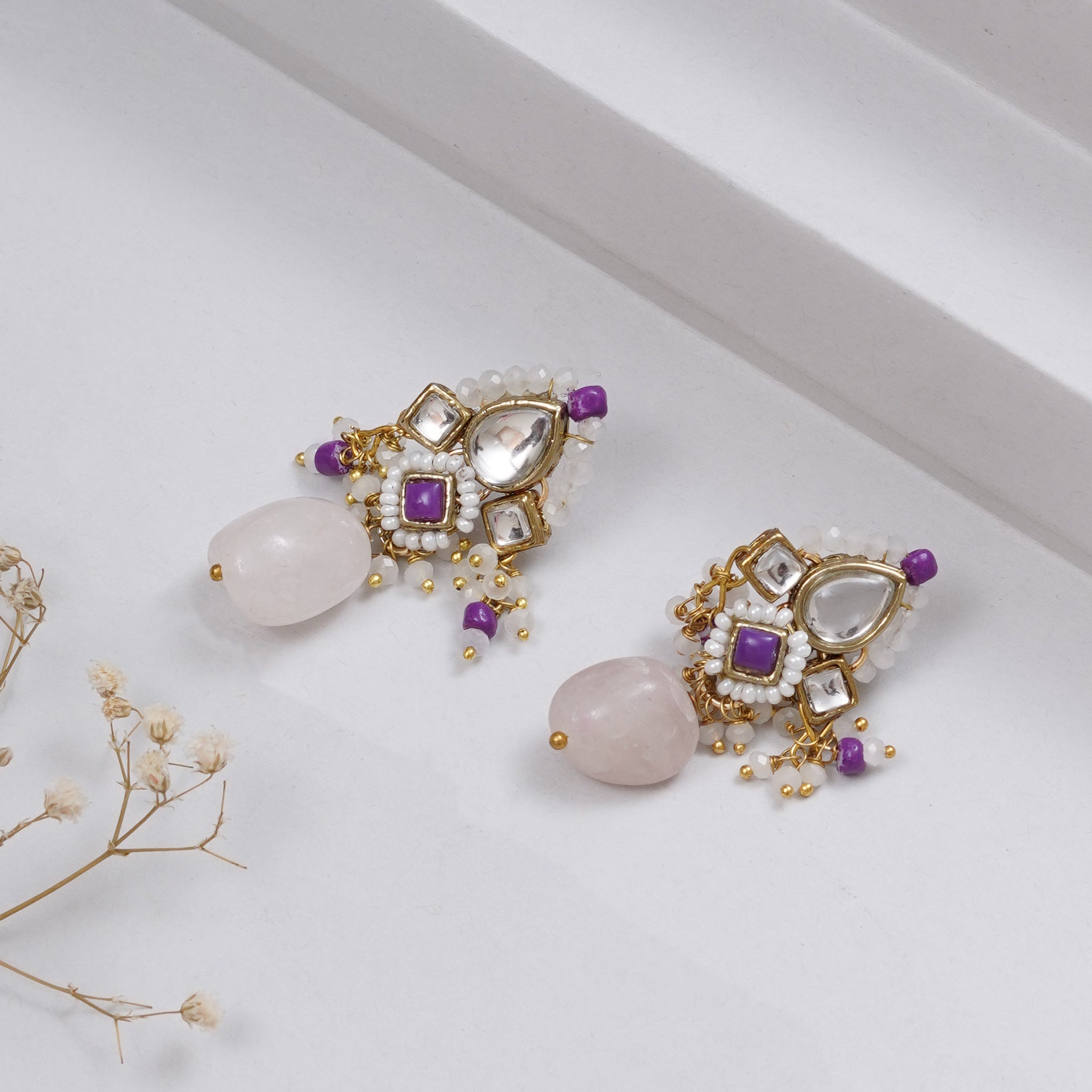 Traditional Kundan earrings in gold-tone, perfect for weddings and festive wear