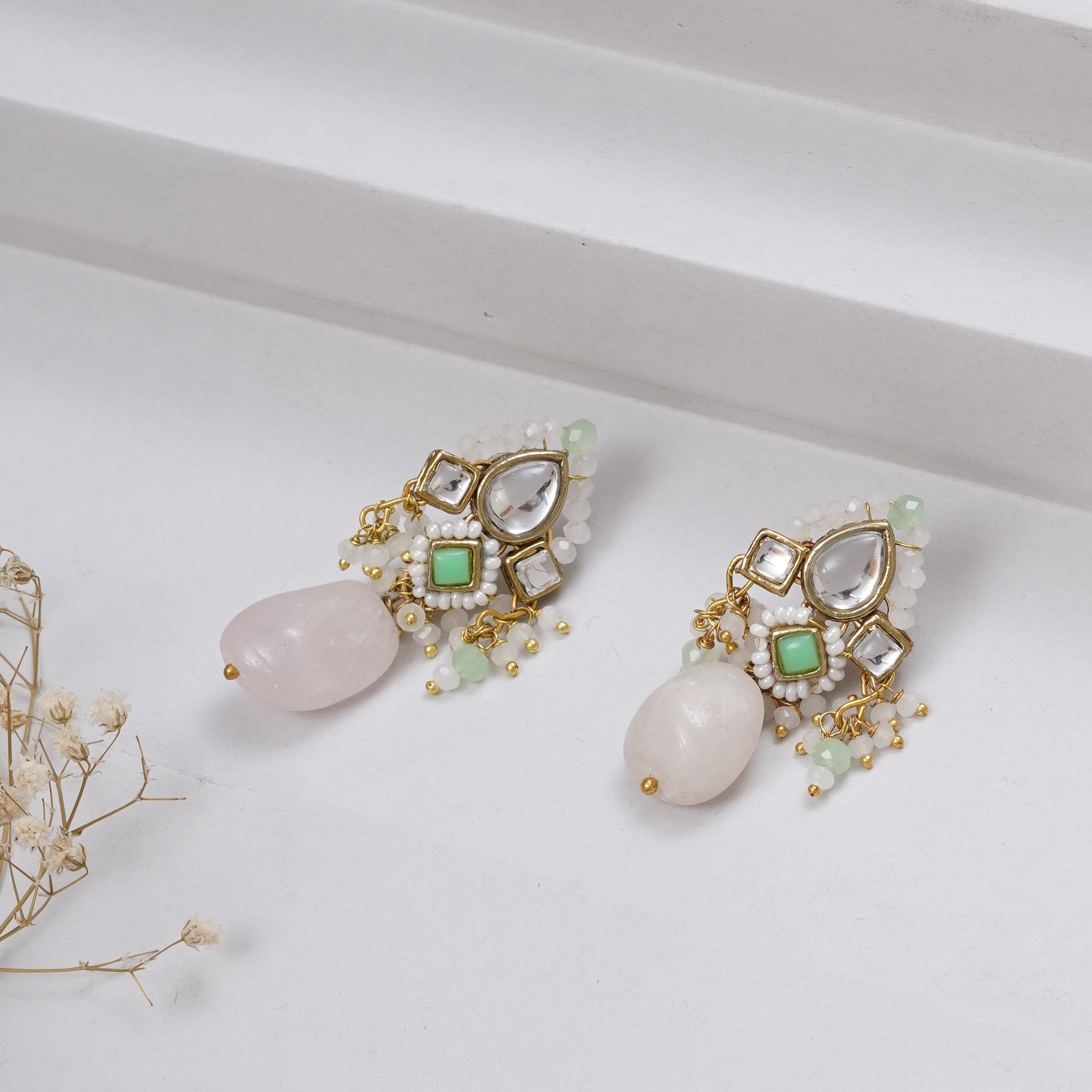 Traditional Kundan earrings in gold-tone, perfect for weddings and festive wear