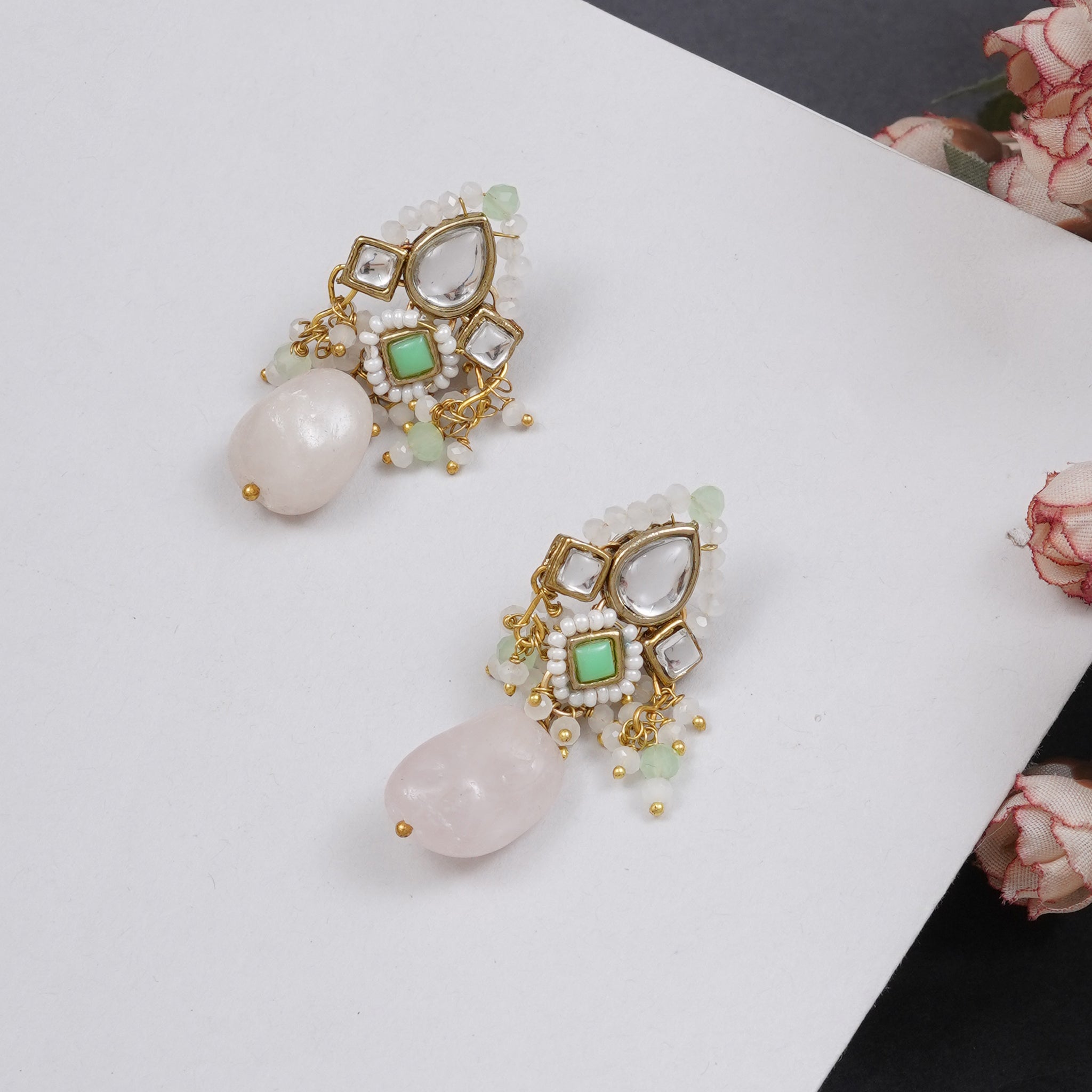 Traditional Kundan earrings in gold-tone, perfect for weddings and festive wear