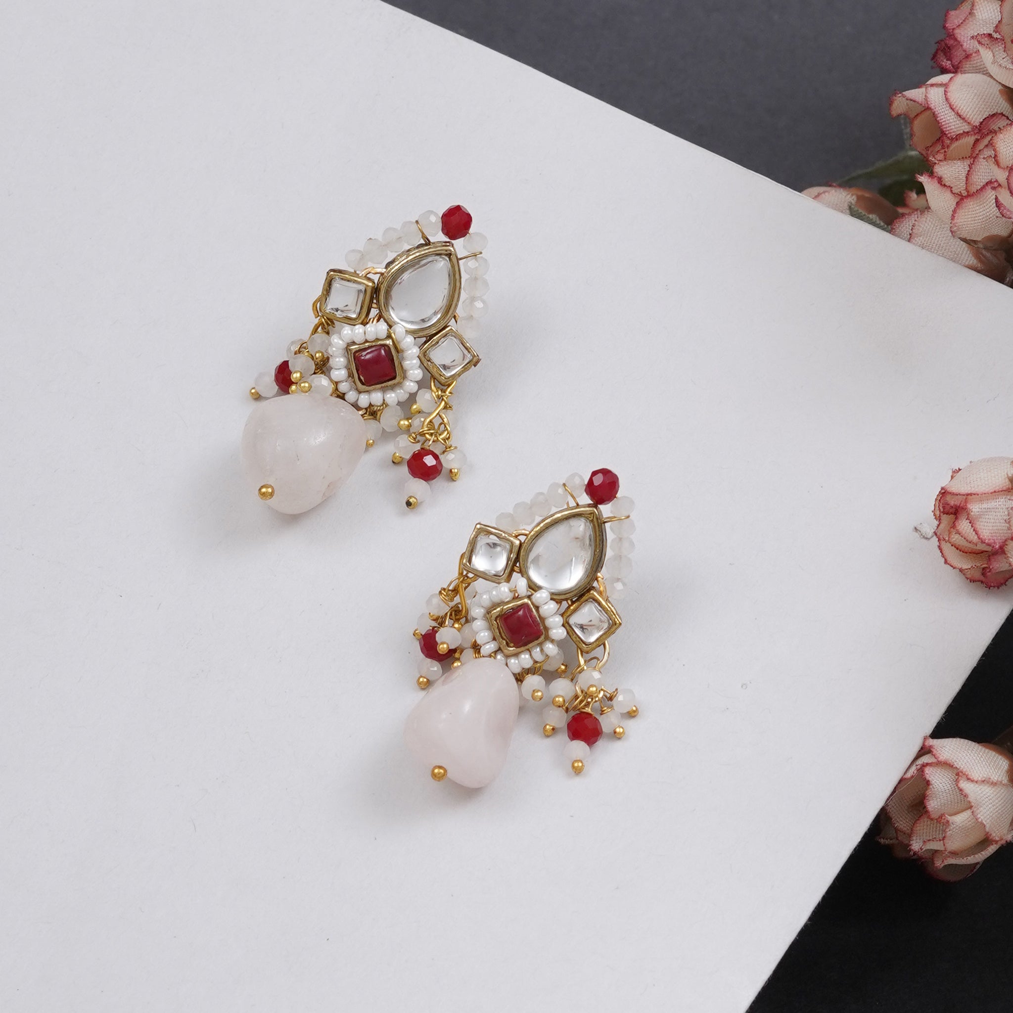 Traditional Kundan earrings in gold-tone, perfect for weddings and festive wear