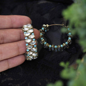 Traditional Kundan earrings in gold-tone, perfect for weddings and festive wear