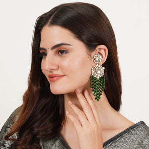 Traditional Kundan earrings in gold-tone, perfect for weddings and festive wear