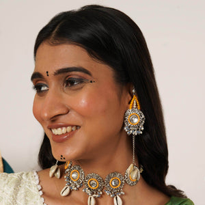 Traditional Kundan earrings in gold-tone, perfect for weddings and festive wear