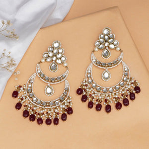 Traditional Kundan earrings in gold-tone, perfect for weddings and festive wear