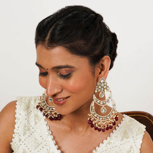 Traditional Kundan earrings in gold-tone, perfect for weddings and festive wear